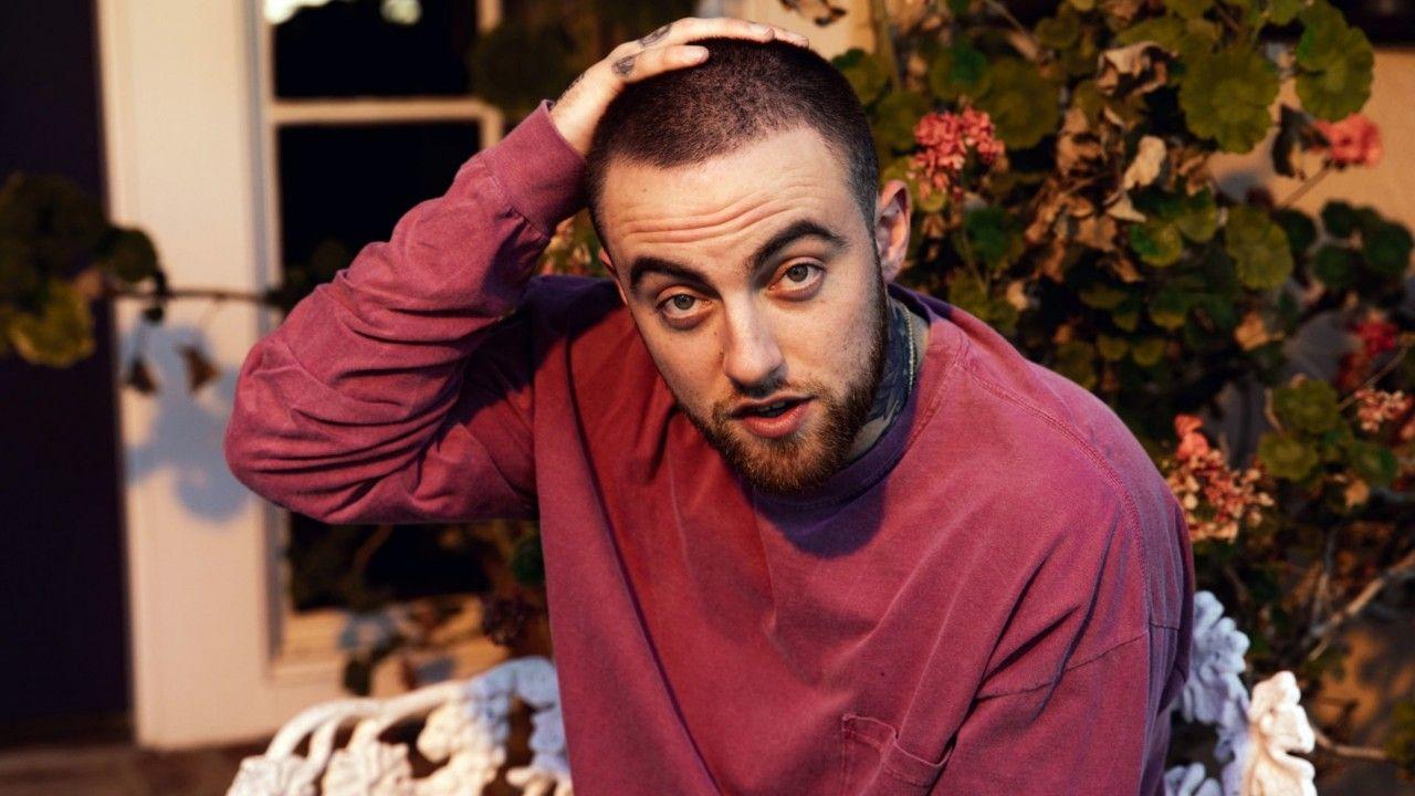 1280x720 Mac Miller Is Sitting On A Chair In A Background Of Plants 11 4K HD Celebrities Wallpaper