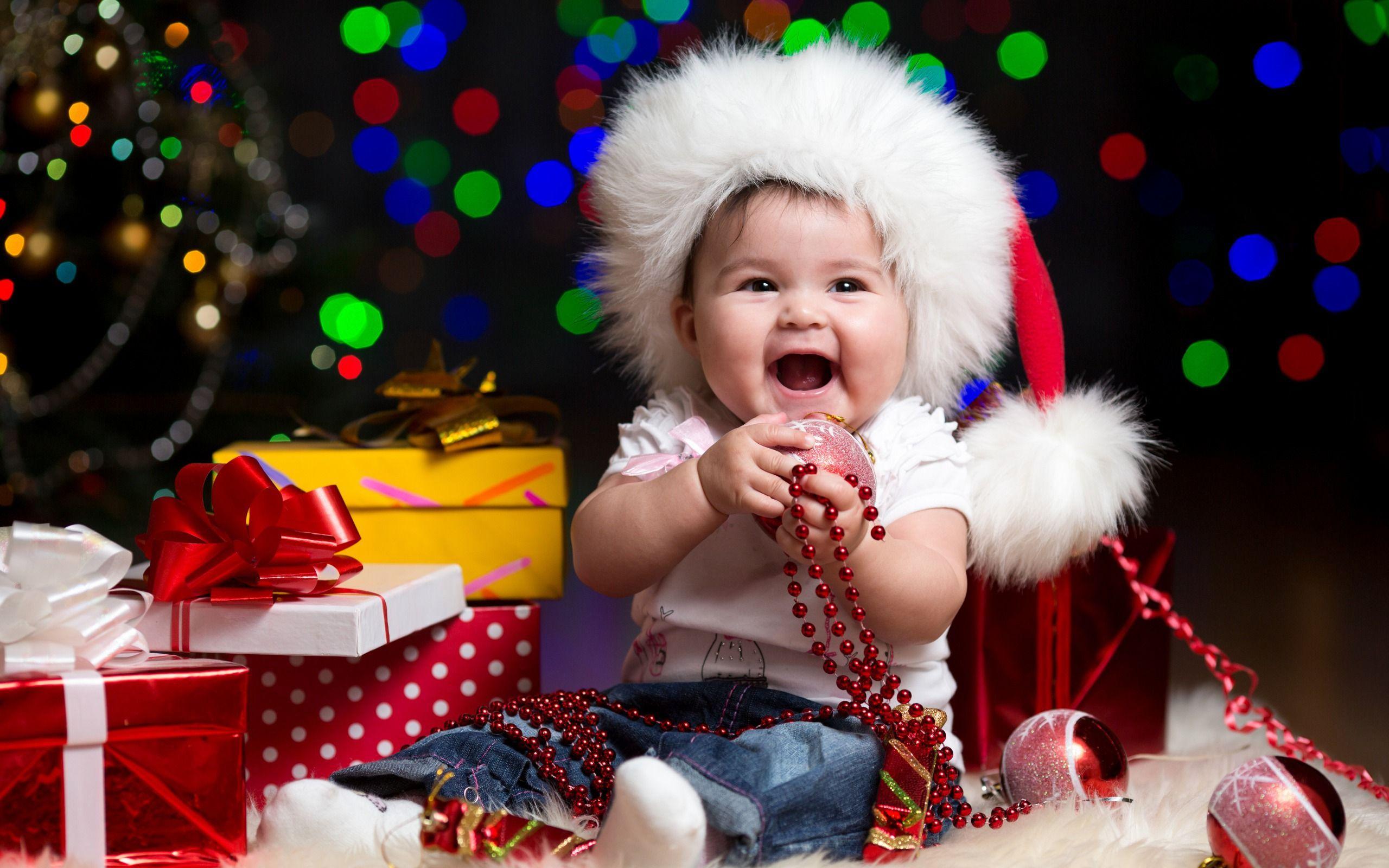 2560x1600 The happy child on Christmas Desktop wallpaper 2560x1600