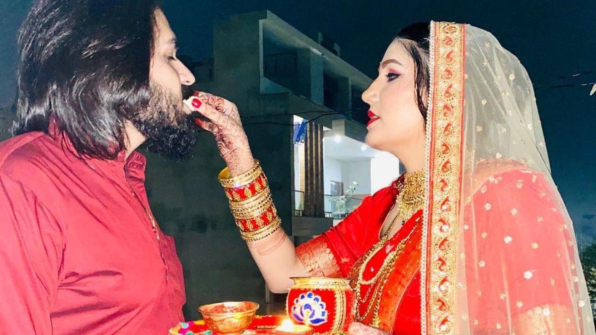 1200x675 Sapna Choudhary shares FIRST PICS with husband Veer Sahu on Karwa Chauth, stuns in red outfit