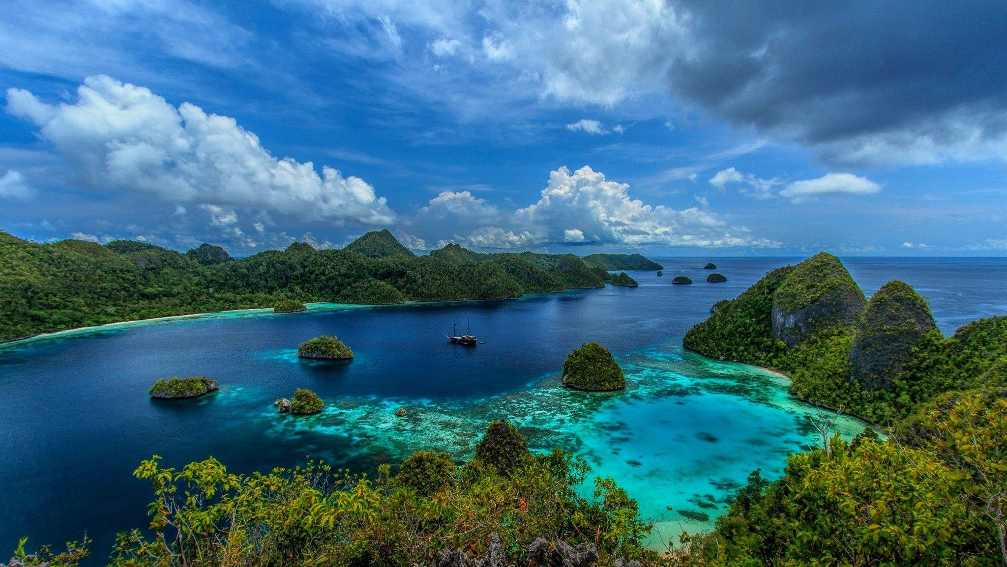 2048x1154 Sea And Mountain Indonesia HD Wallpaper