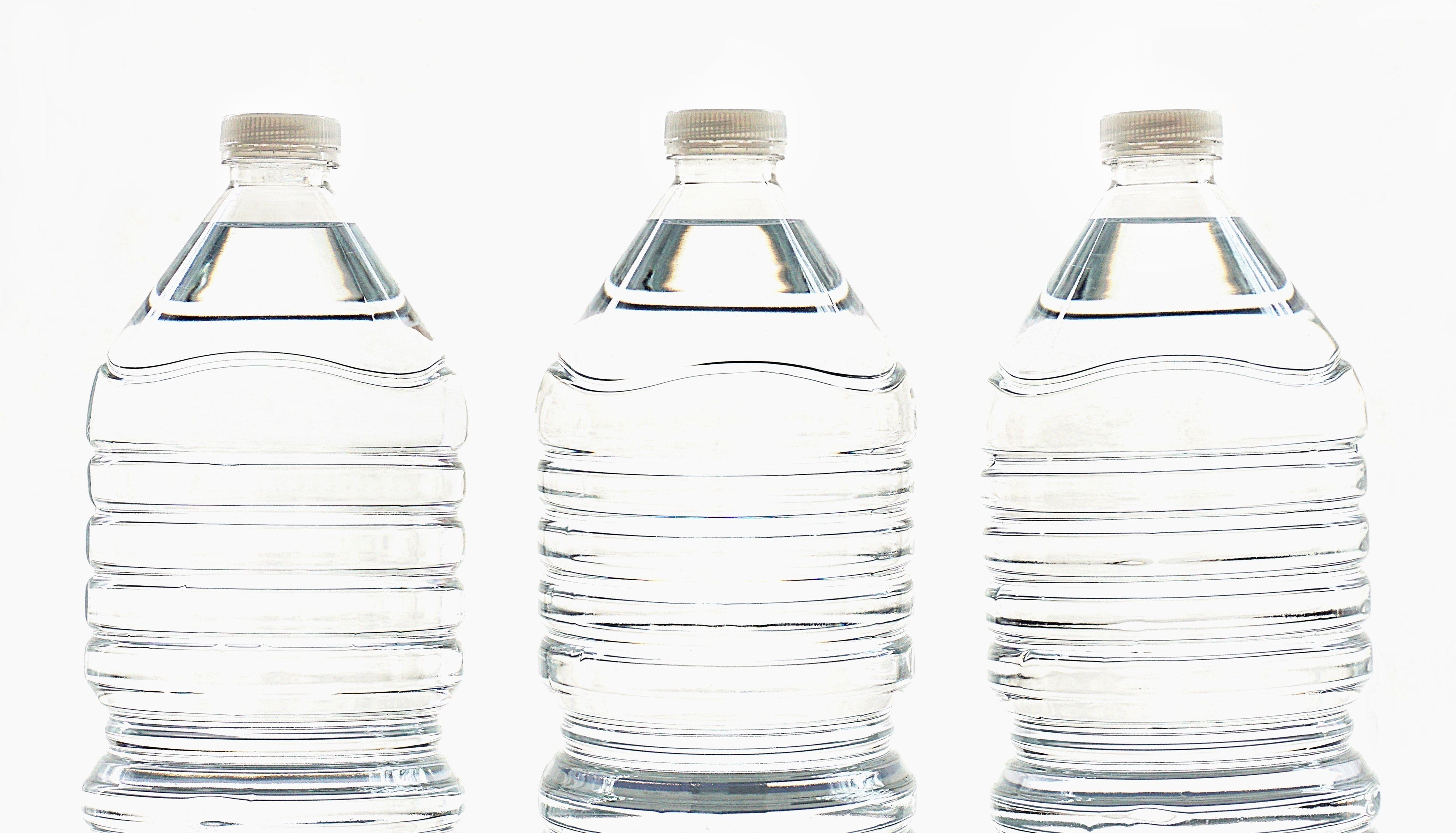 4866x2785 Three Clear Water Bottles · Free