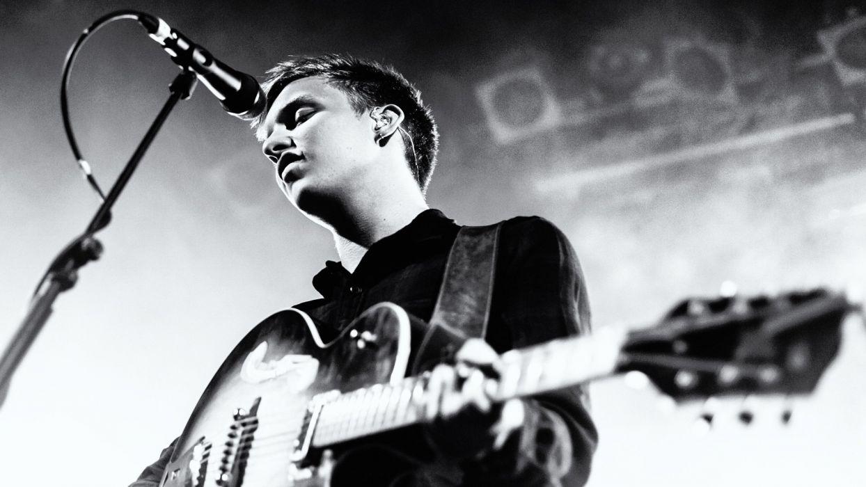 1244x700 GEORGE EZRA singer folk blues rock 1ezra concert guitar wallpaperx1080