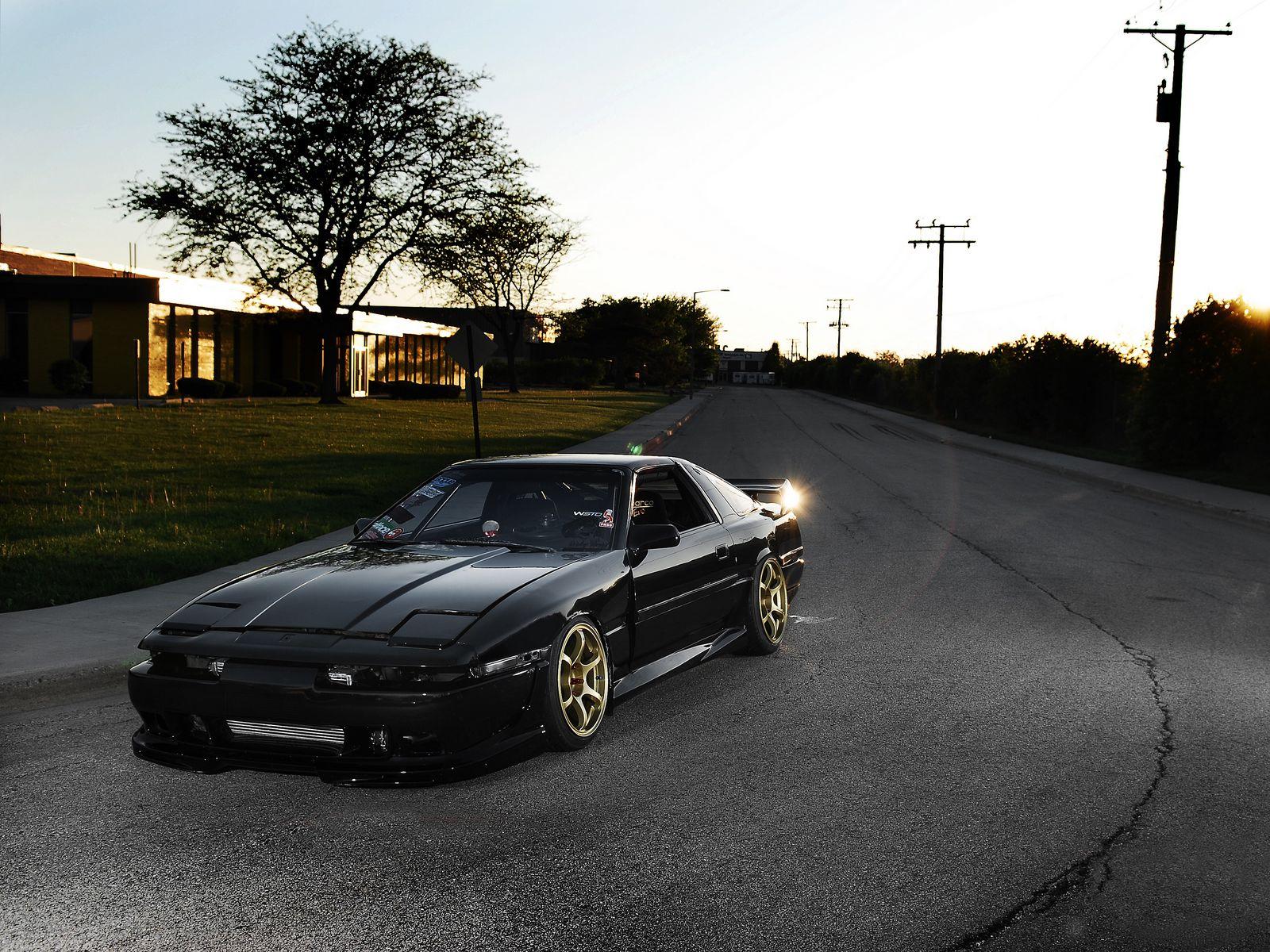 1600x1200 Download wallpaper 1600x1200 toyota, supra, ma black, front part, tuning, street, sun, glare standard 4:3 HD background