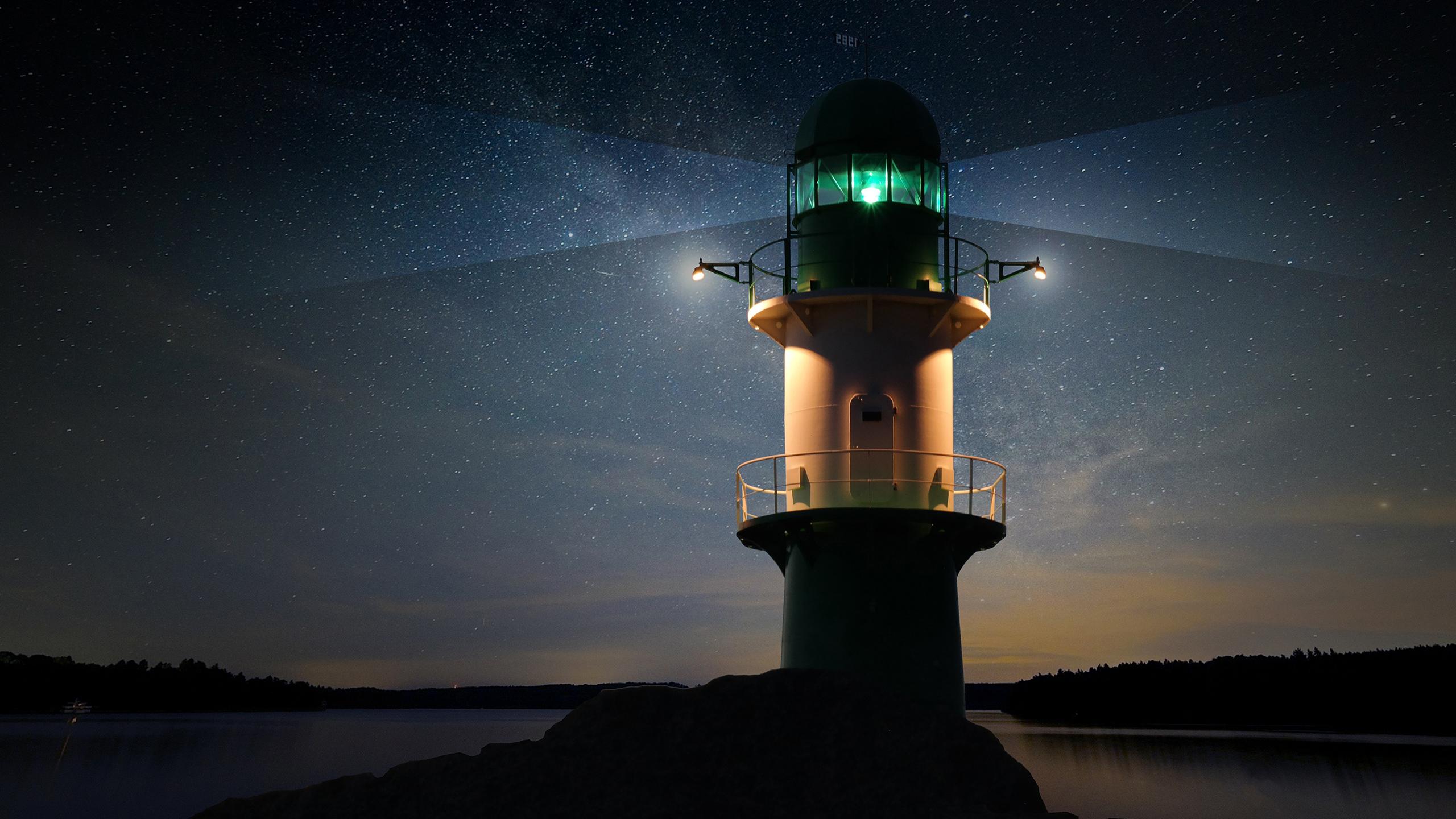 2560x1440 Lighthouse at Night Wallpaper