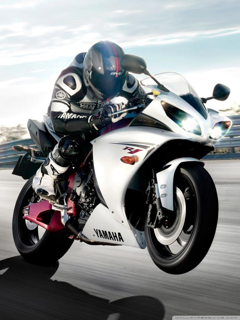 768x1024 Yamaha R1 Wheelie Wallpaper