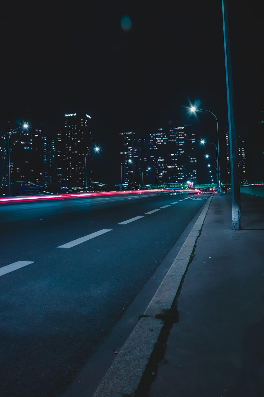 910x1365 Highway at Night Wallpaper