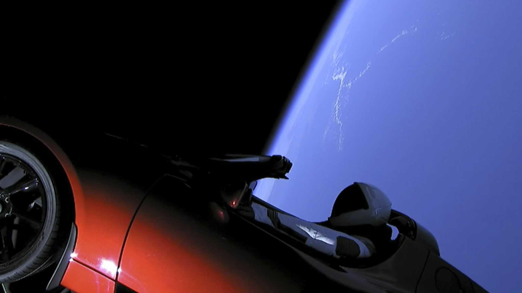 2048x1152 Starman And His Cherry Red Tesla Approach Mars