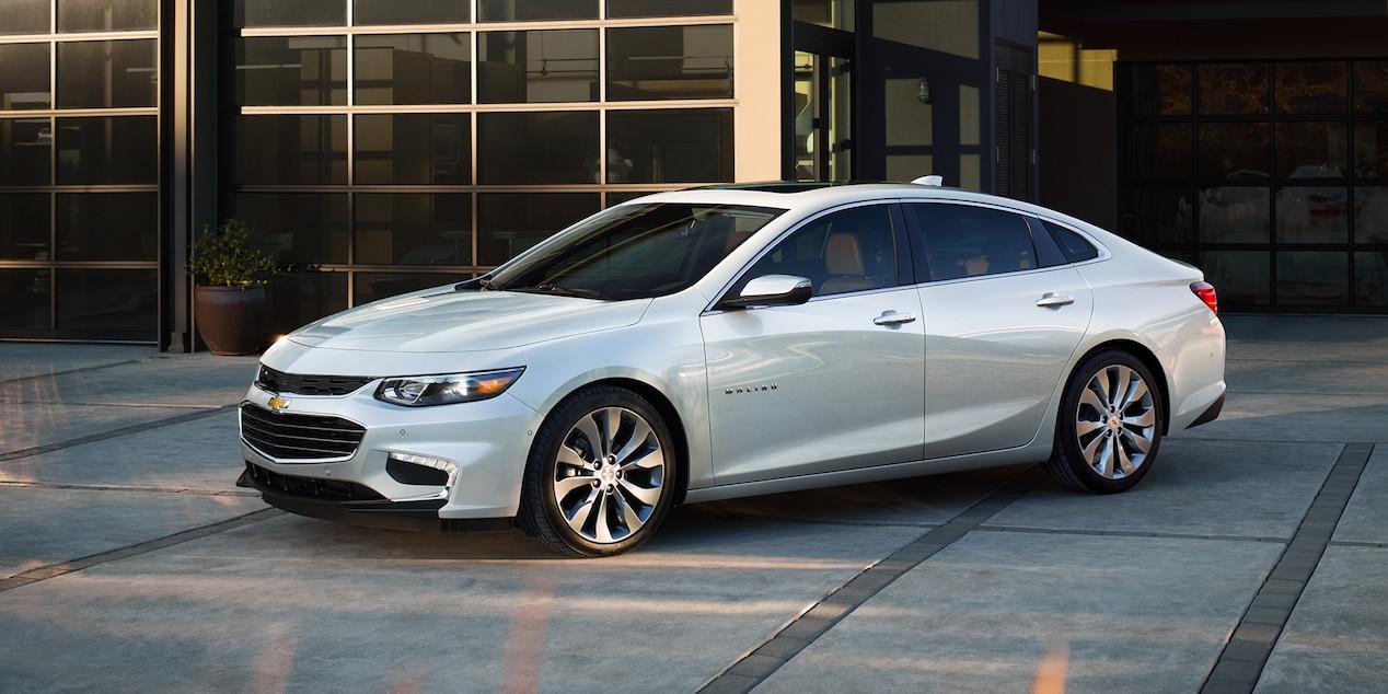 1268x634 Chevrolet Malibu white color side view 4k uhd wallpaper