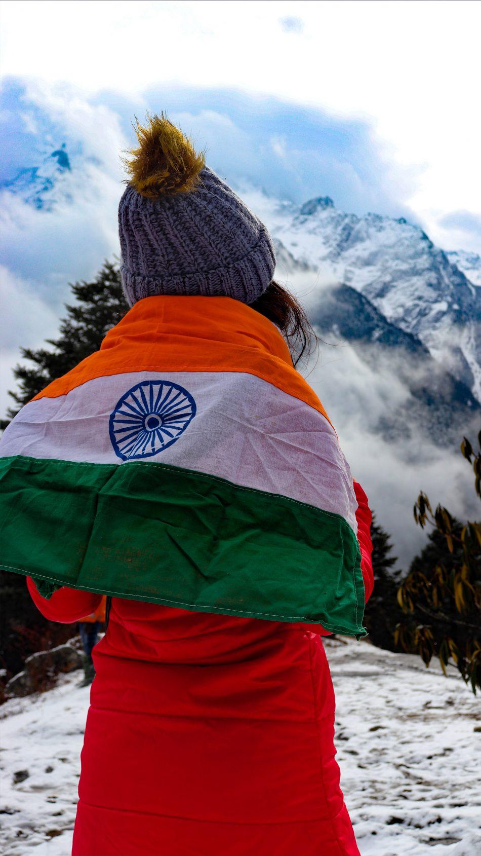 950x1689 Girl Indian Flag Snow Mountains 4K Ultra HD Mobile Wallpaper