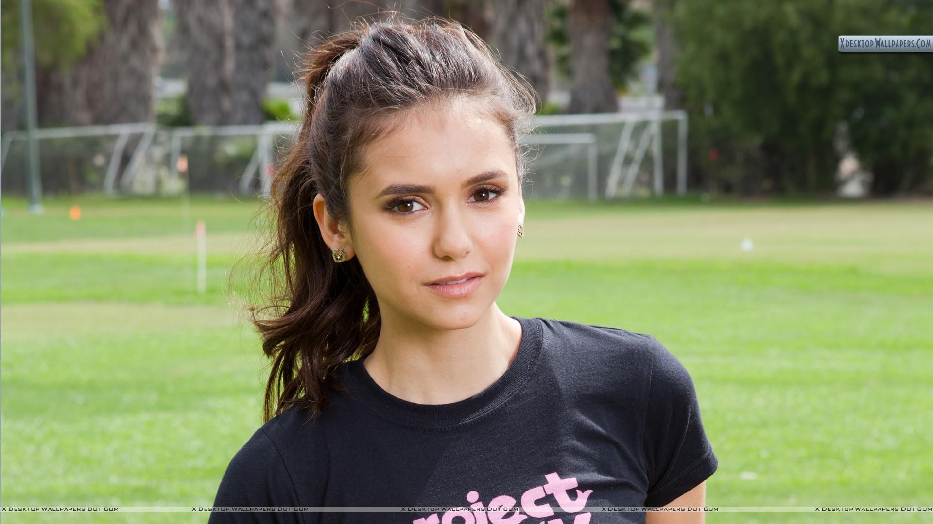 1920x1080 Nina Dobrev In Black T Shirt In Stadium Wallpaper
