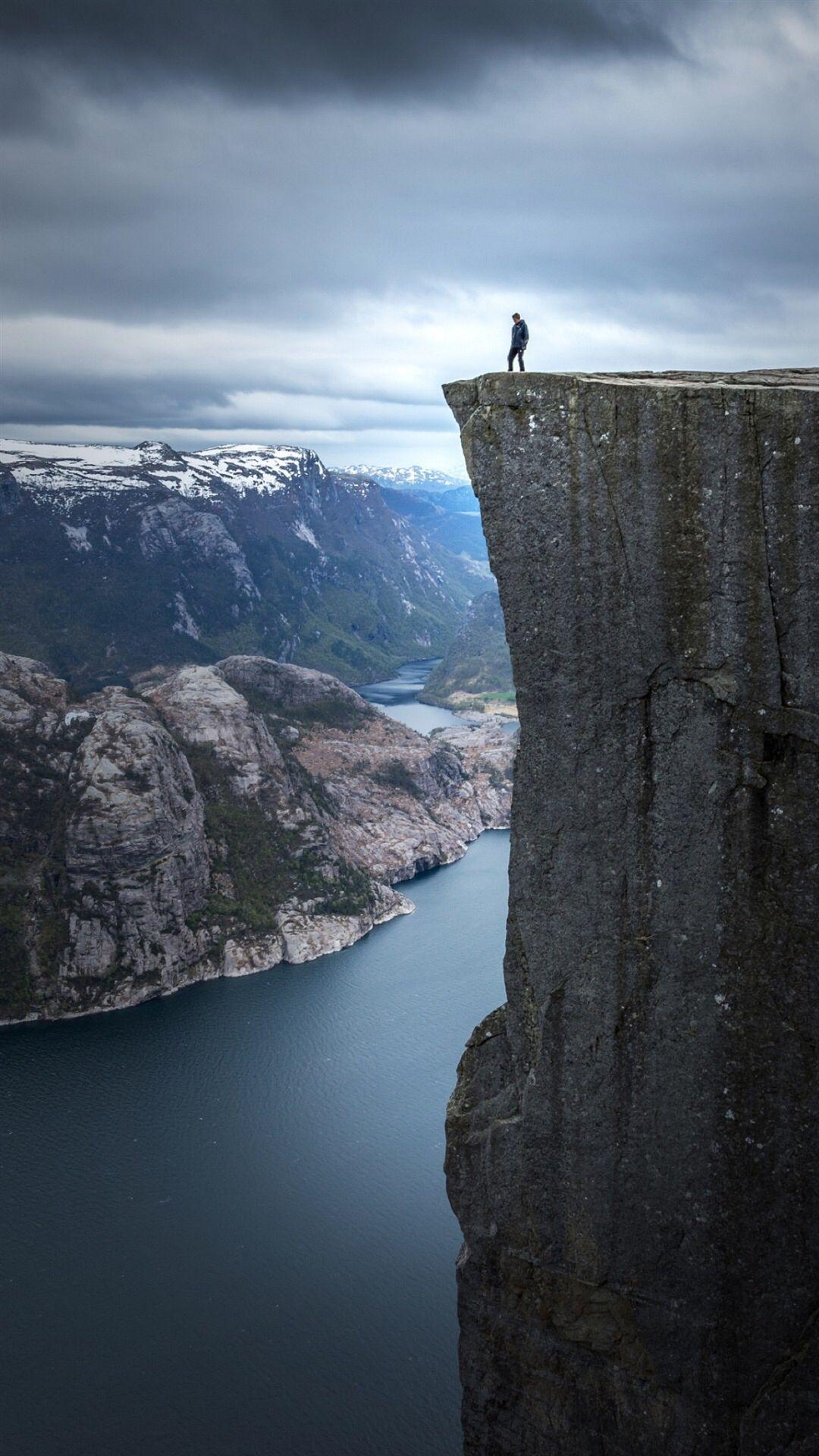 Man sitting on cliff HD phone wallpaper  Peakpx