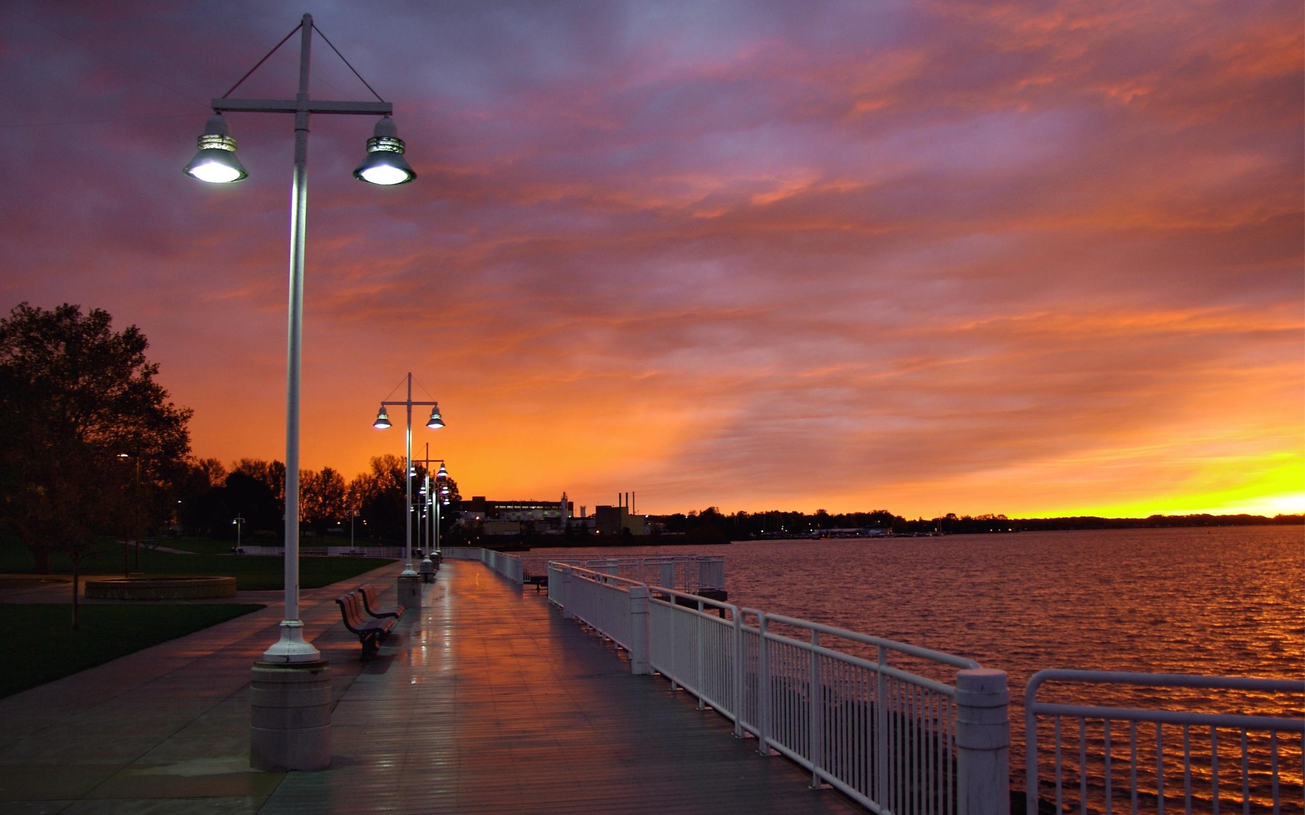 2560x1600 City Embankment Evening Sunset Wallpaper