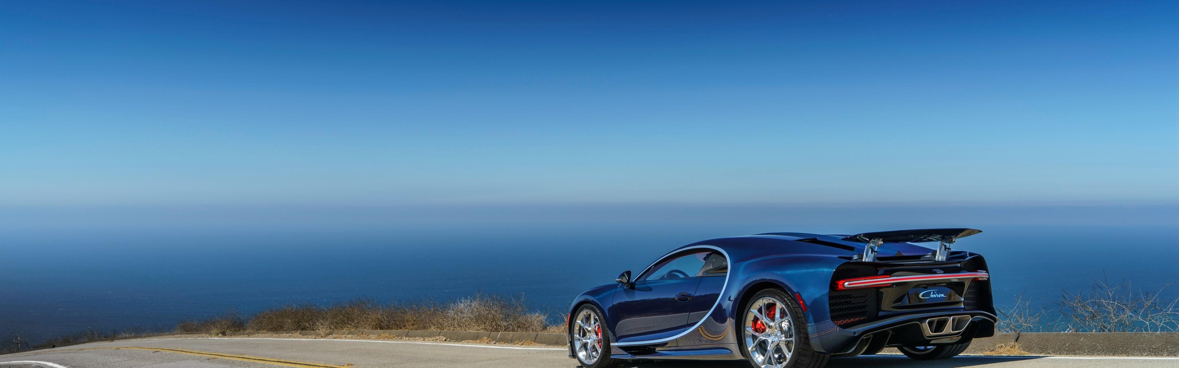 3840x1200 Download 3840x1200 Bugatti Chiron, Black, Back View, Road, Sea, Sky, Cars Wallpaper