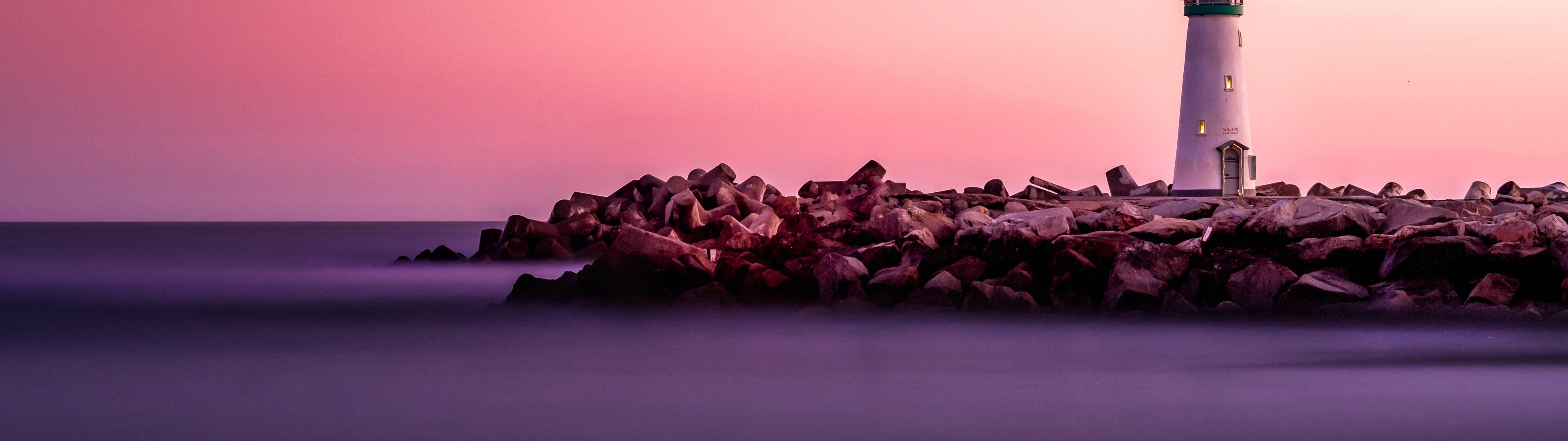 3840x1080 Download 3840x1080 Lighthouse, Rocks, Sunset, Clean Sky Wallpaper