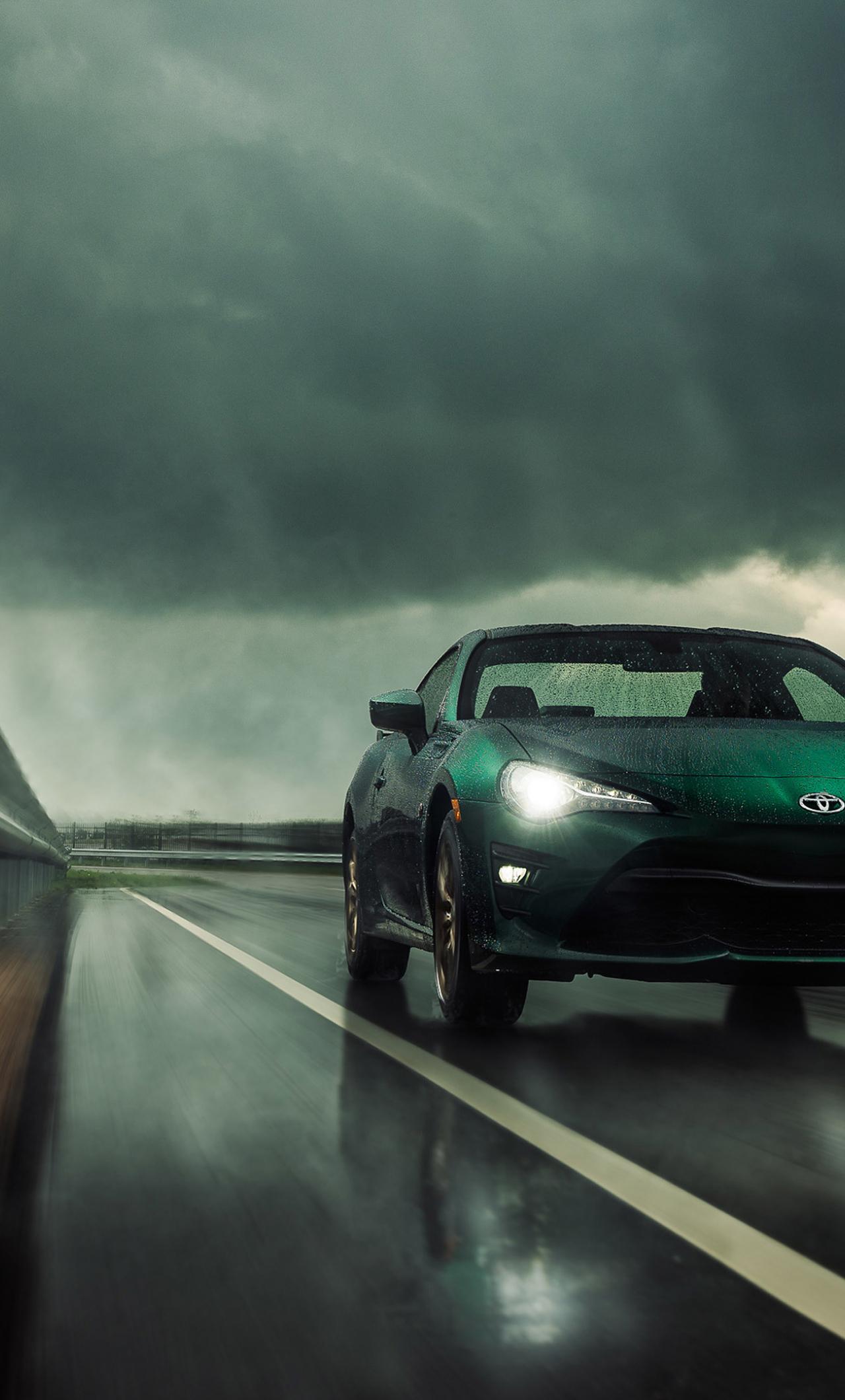1280x2120 Download 1280x2120 Wallpaper On Road, Green Car Toyota Gt Toyota, Iphone 6 Plus, 1280x2120 HD Image, Background, 24016