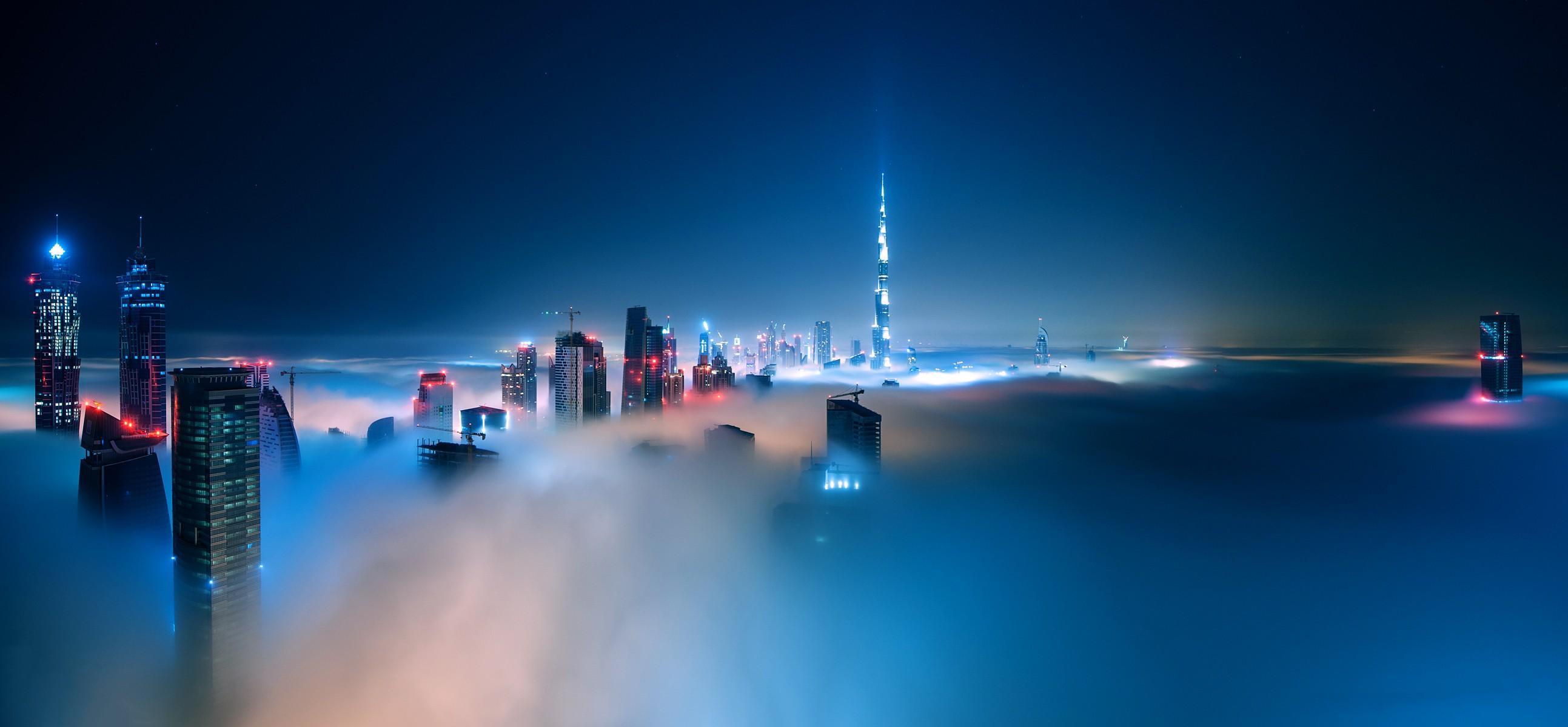 2586x1200 #cityscape, #mist, #night, #clouds, #building, #Dubai, #skyscraper, #Burj Khalifa, #city, wallpaper. Mocah HD Wallpaper