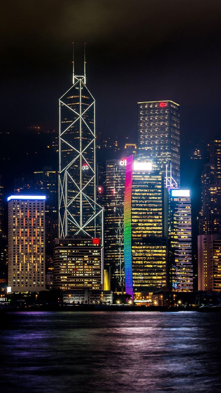 750x1334 Hong Kong skyscrapers night shore iPhone 8 Wallpaper Free Download