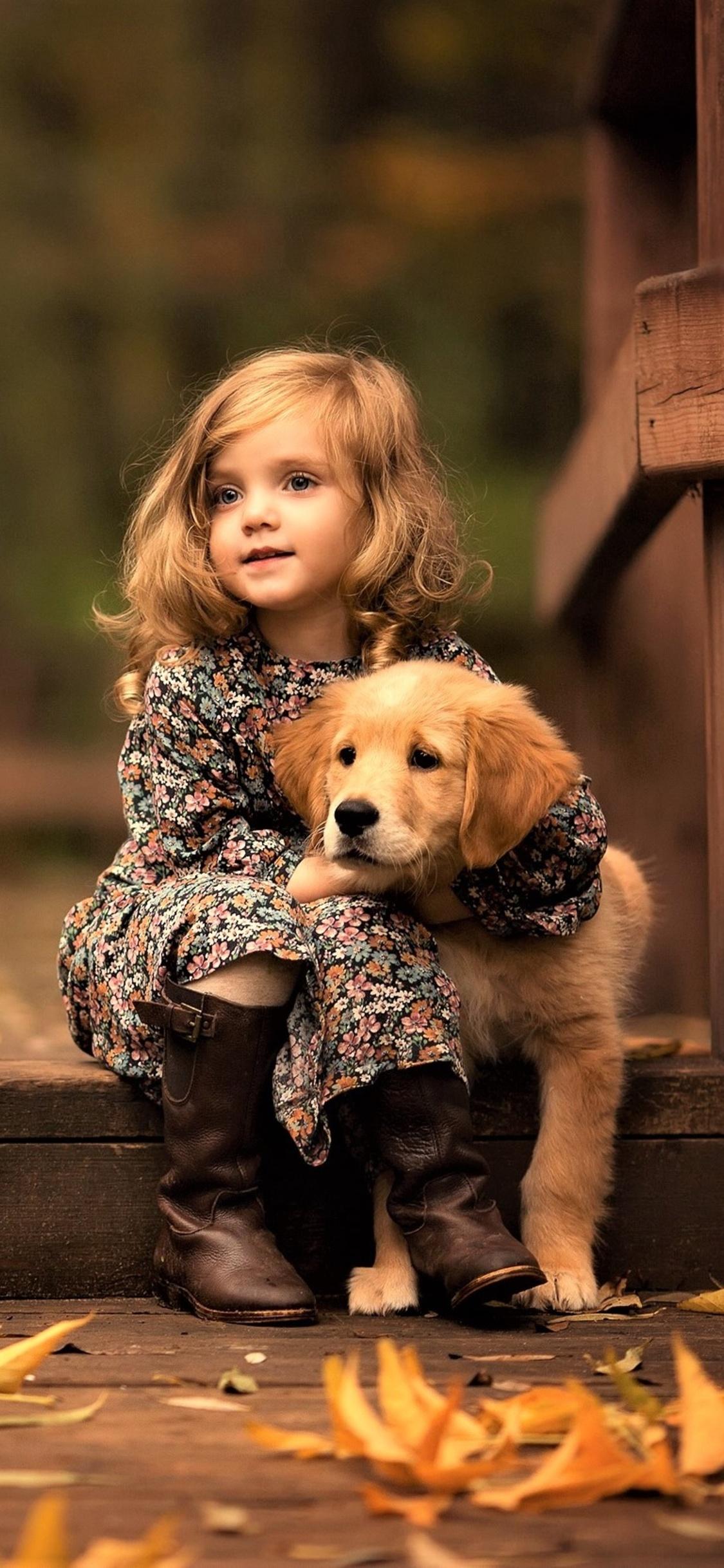 1125x2436 Little Girl With Golden Retriever Puppy iPhone XS, iPhone iPhone X HD 4k Wallpaper, Image, Background, Photo and Picture