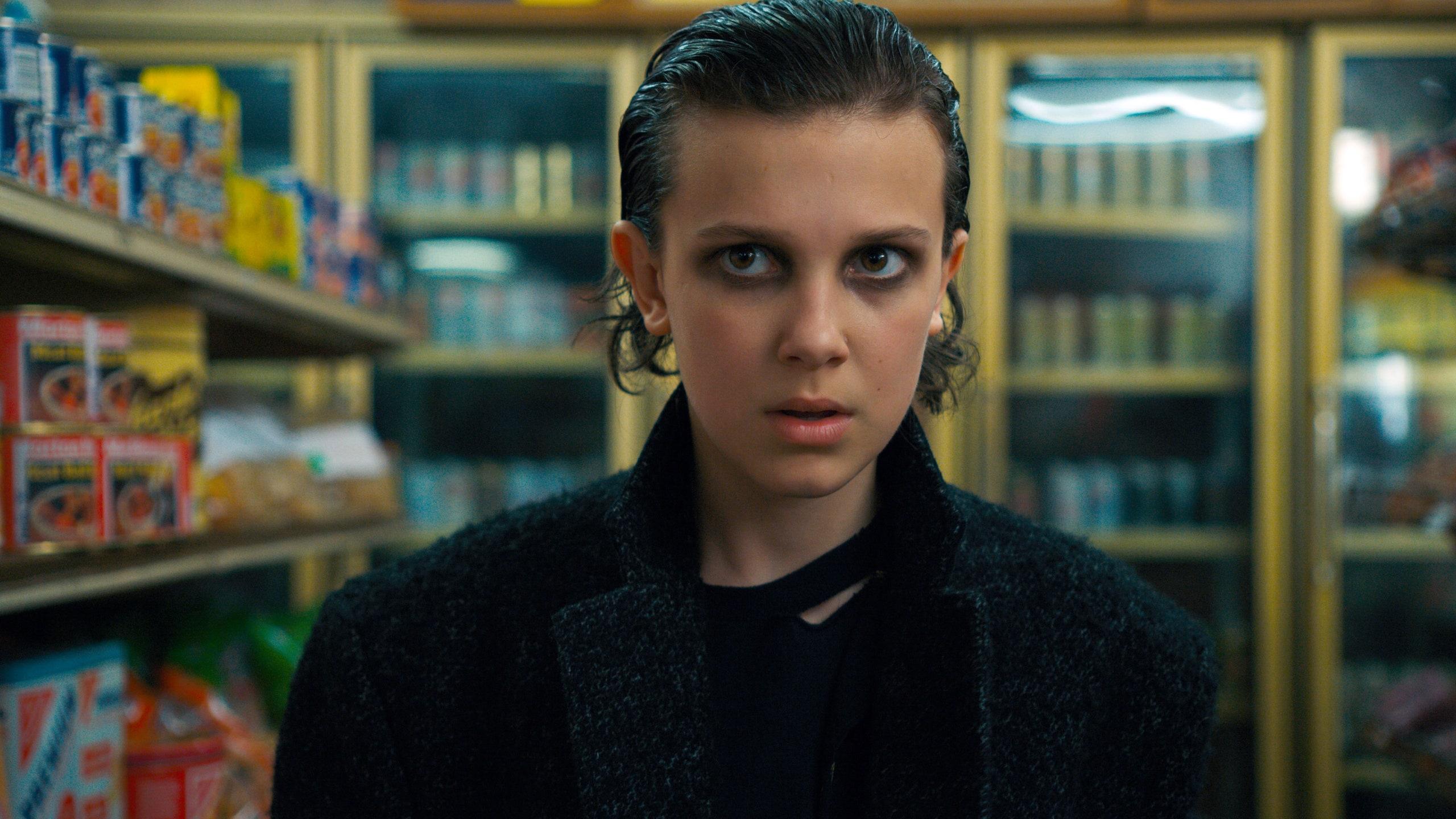 2560x1440 Stranger Things Fans Have Formed Intense Theories Based on Set Photo of Millie Bobby Brown