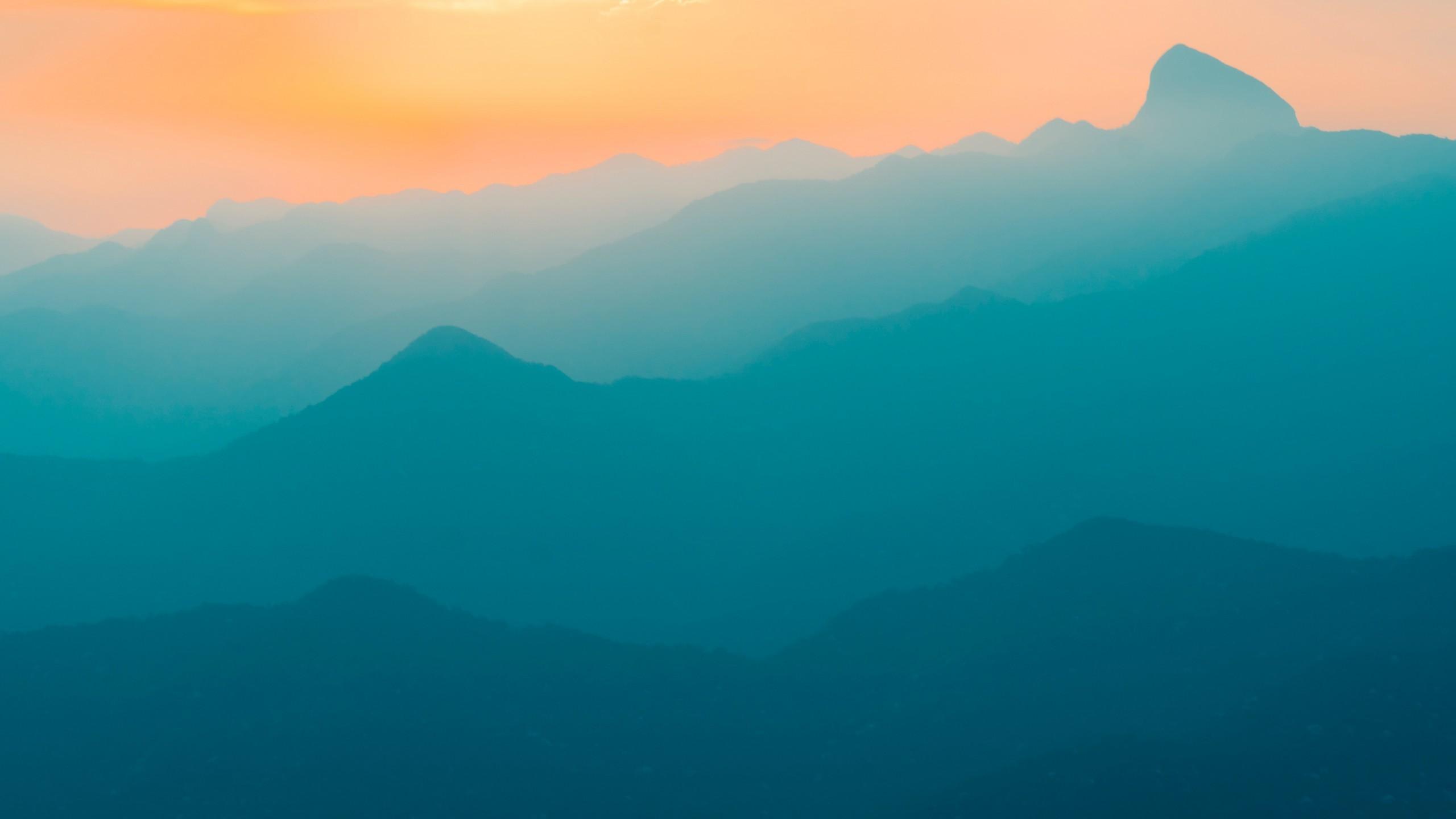 2560x1440 Download 2560x1440 Turquoise Mountains, Sunset, Orange Sky, Silhouette Wallpaper for iMac 27 inch