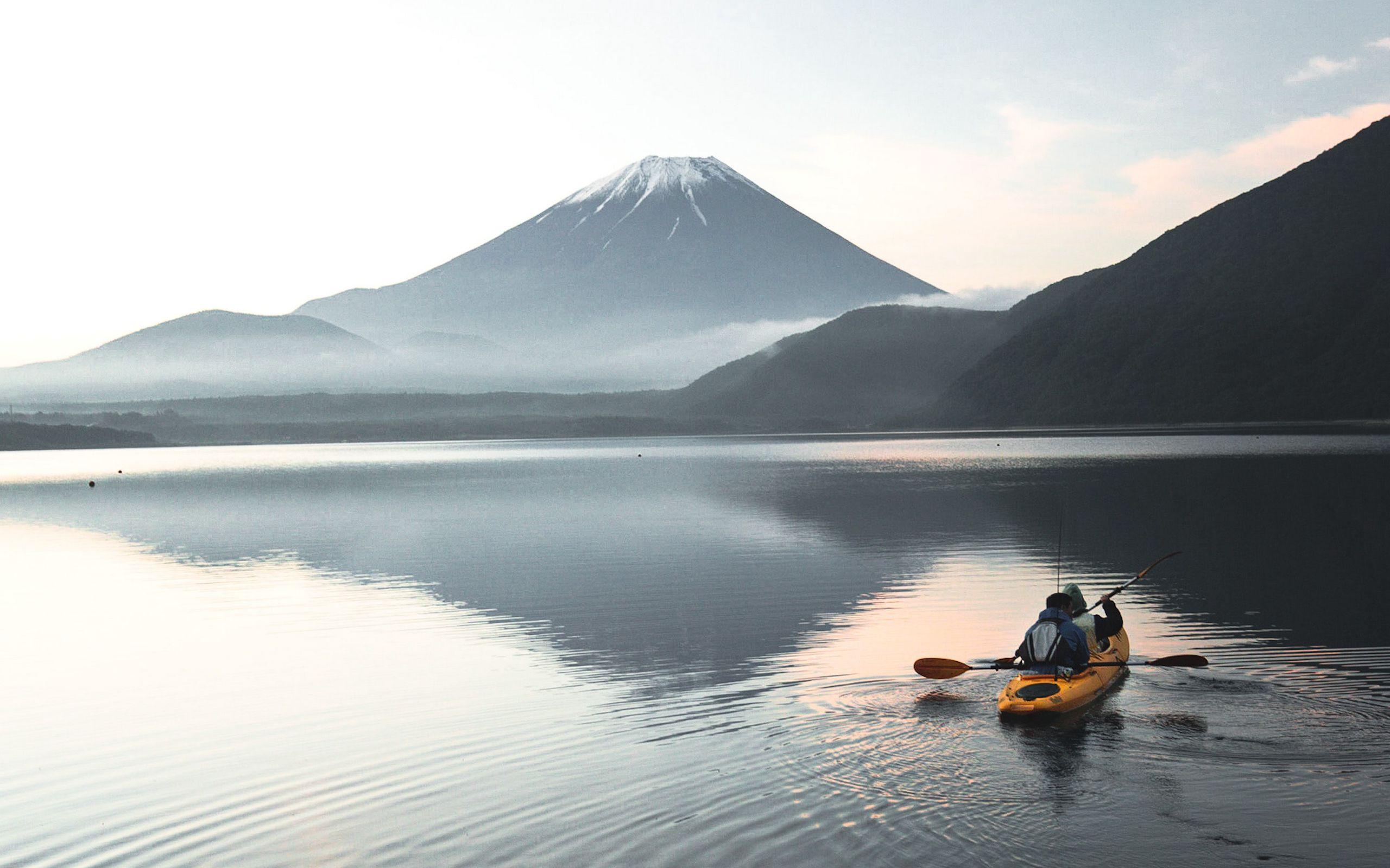 2560x1600 Download wallpaper 2560x1600 boat, canoe, volcano, sea, ripples widescreen 16:10 HD background