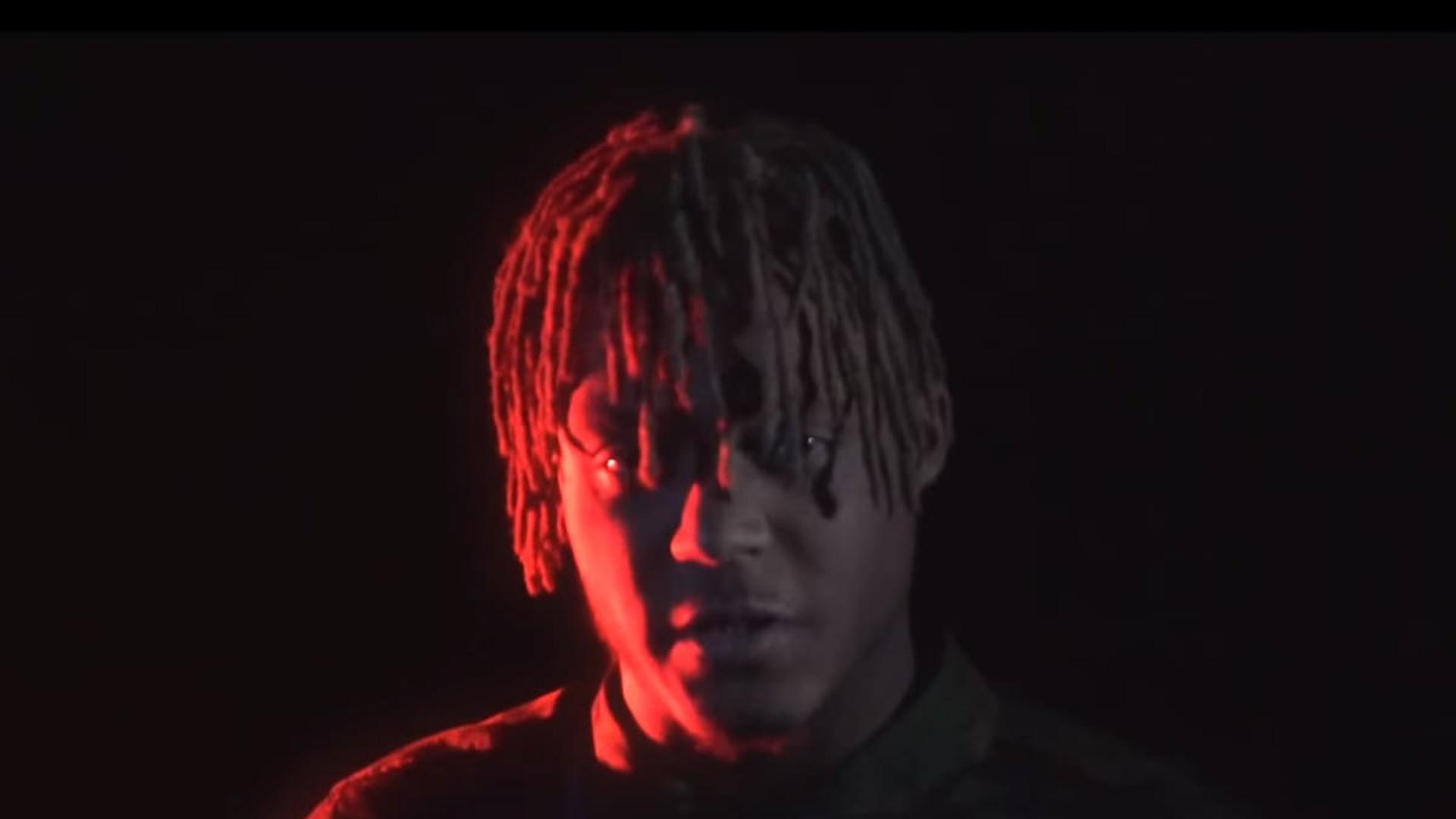 1920x1080 Juice Wrld In Black Background With Red Light On Face HD Juice Wrld Wallpaper