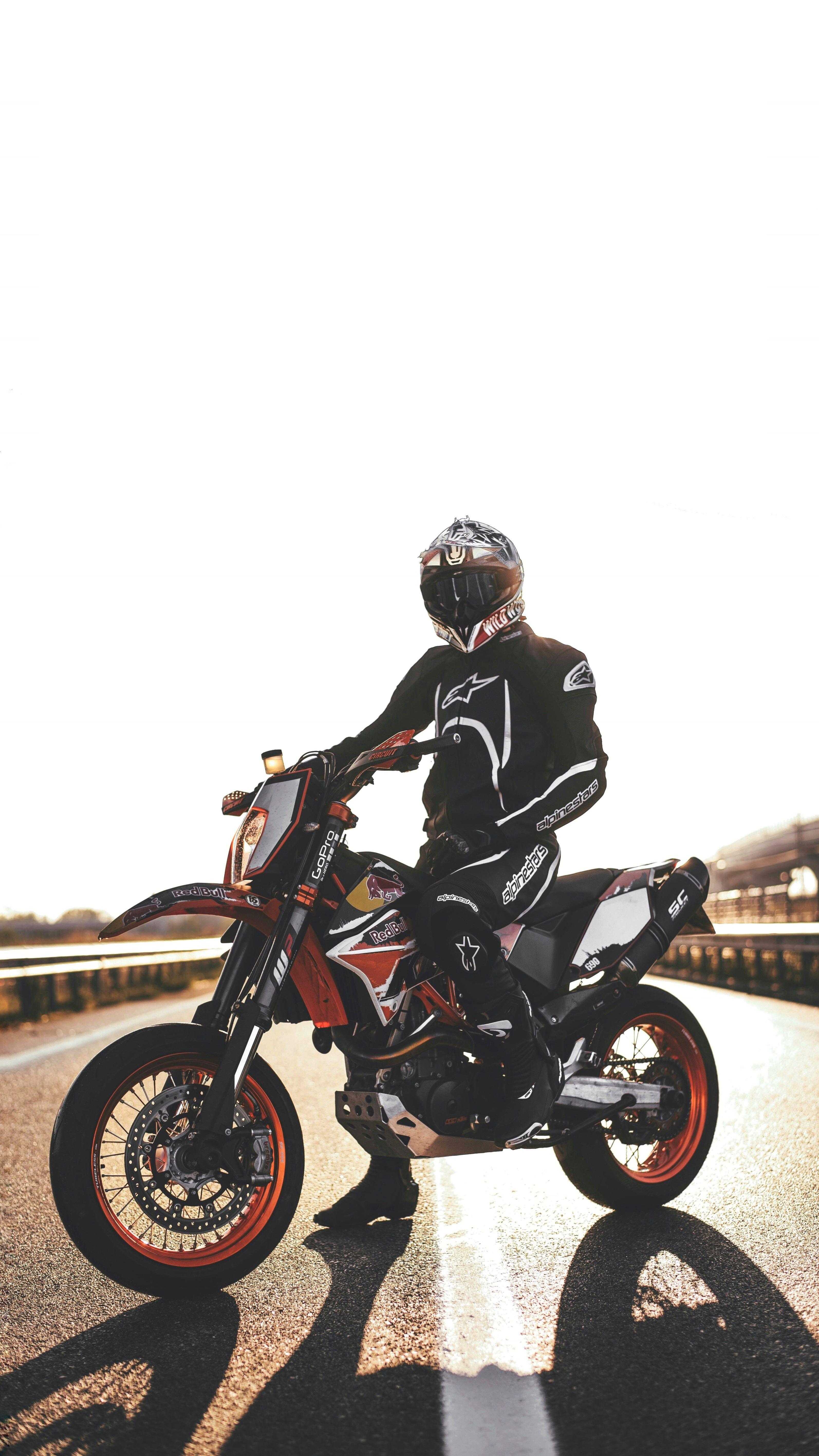 3188x5668 black and orange enduro motorcyle #motorcyclist #motorcycle #helmet K # wallpaper #hdwallpaper #desktop. Motorcycle wallpaper, Supermoto, Motorcycle helmets