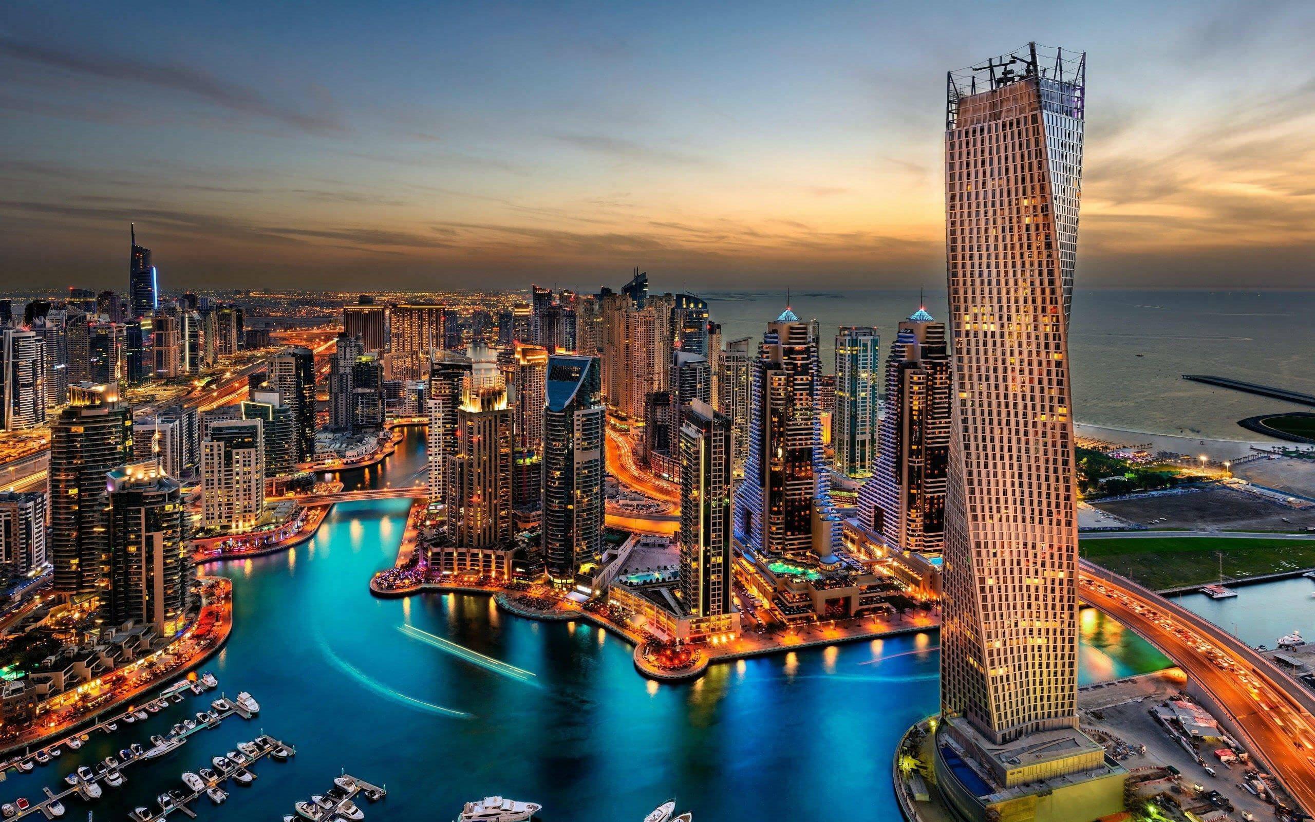 2560x1600 Download wallpaper Dubai, United Arab Emirates, evening, skyscrapers, fountains, Persian Gulf for desktop with resolution 2560x1600. High Quality HD picture wallpaper