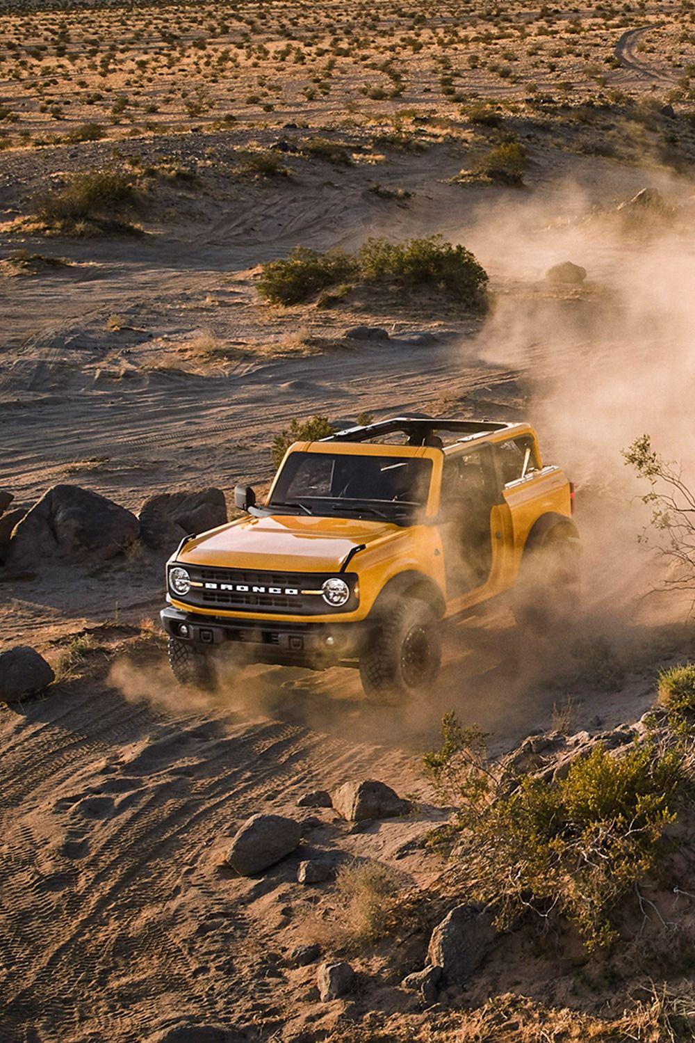 1000x1499 Cyber Orange Ford Bronco Car Wallpaper in Desert. Ford bronco, Bronco car, Broncos wallpaper