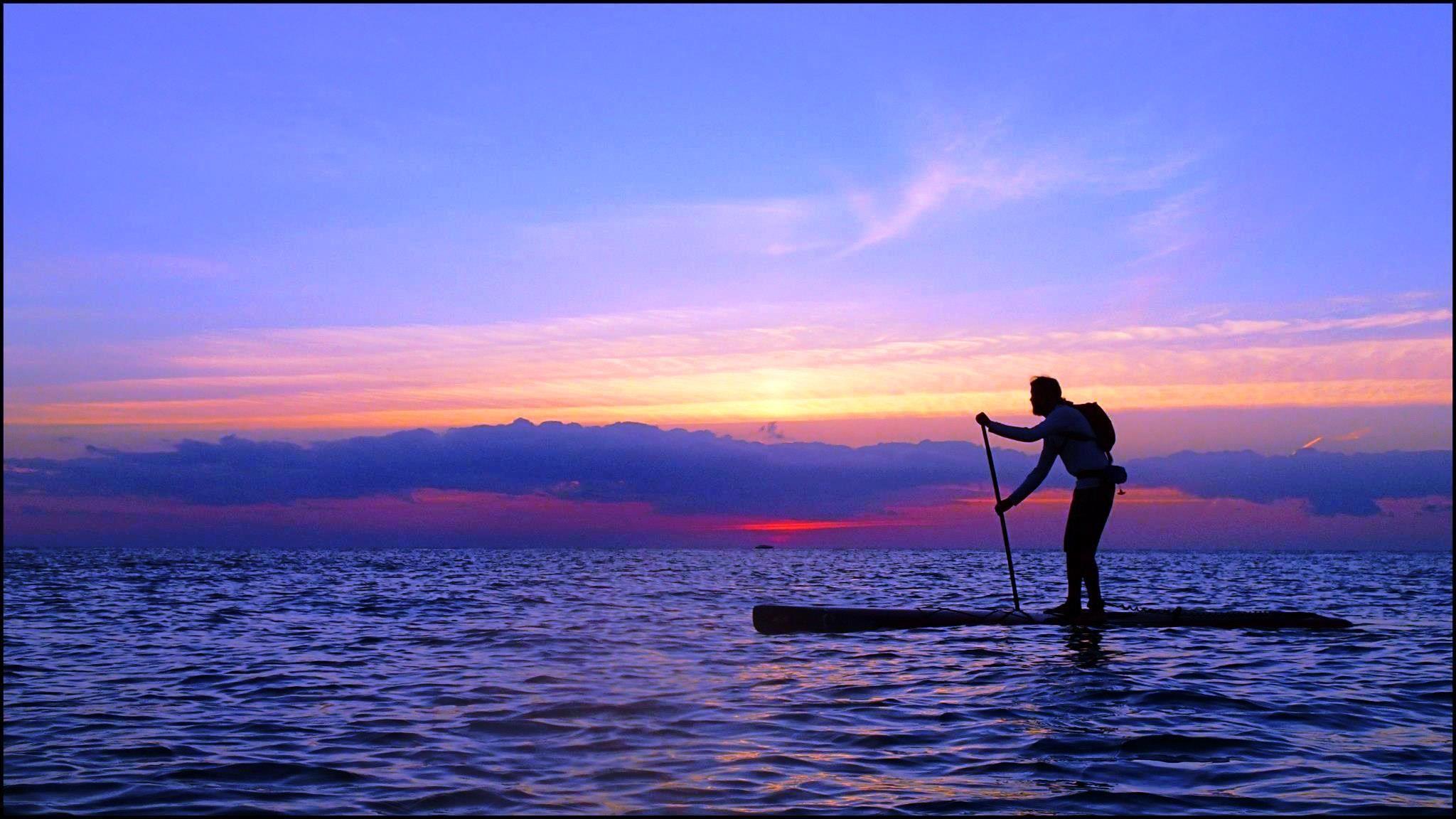 2048x1152 Paddle Boarding Wallpaper
