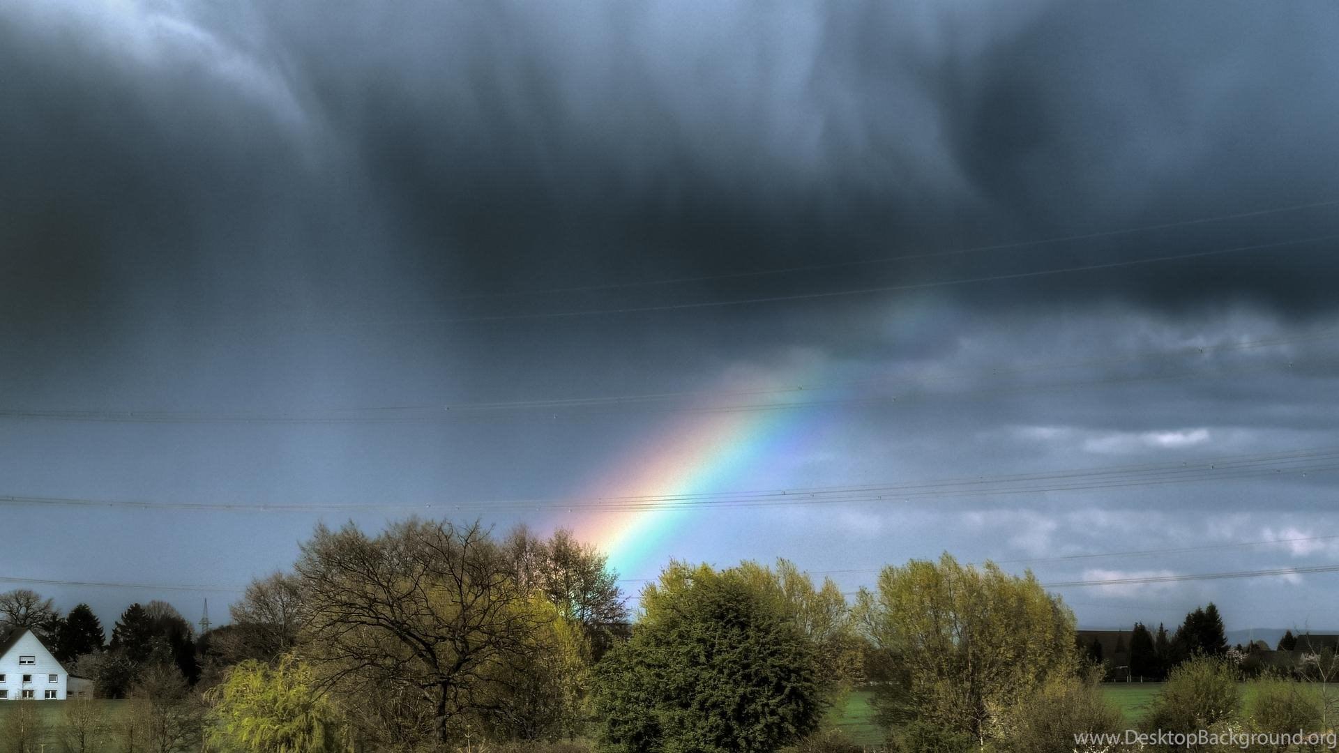 1920x1080 Rainbow Through Rain Clouds Desktop Background