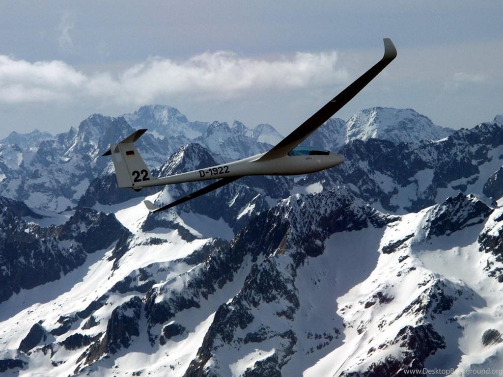1024x768 Glider Sailplane Over Mountains Desktop Background