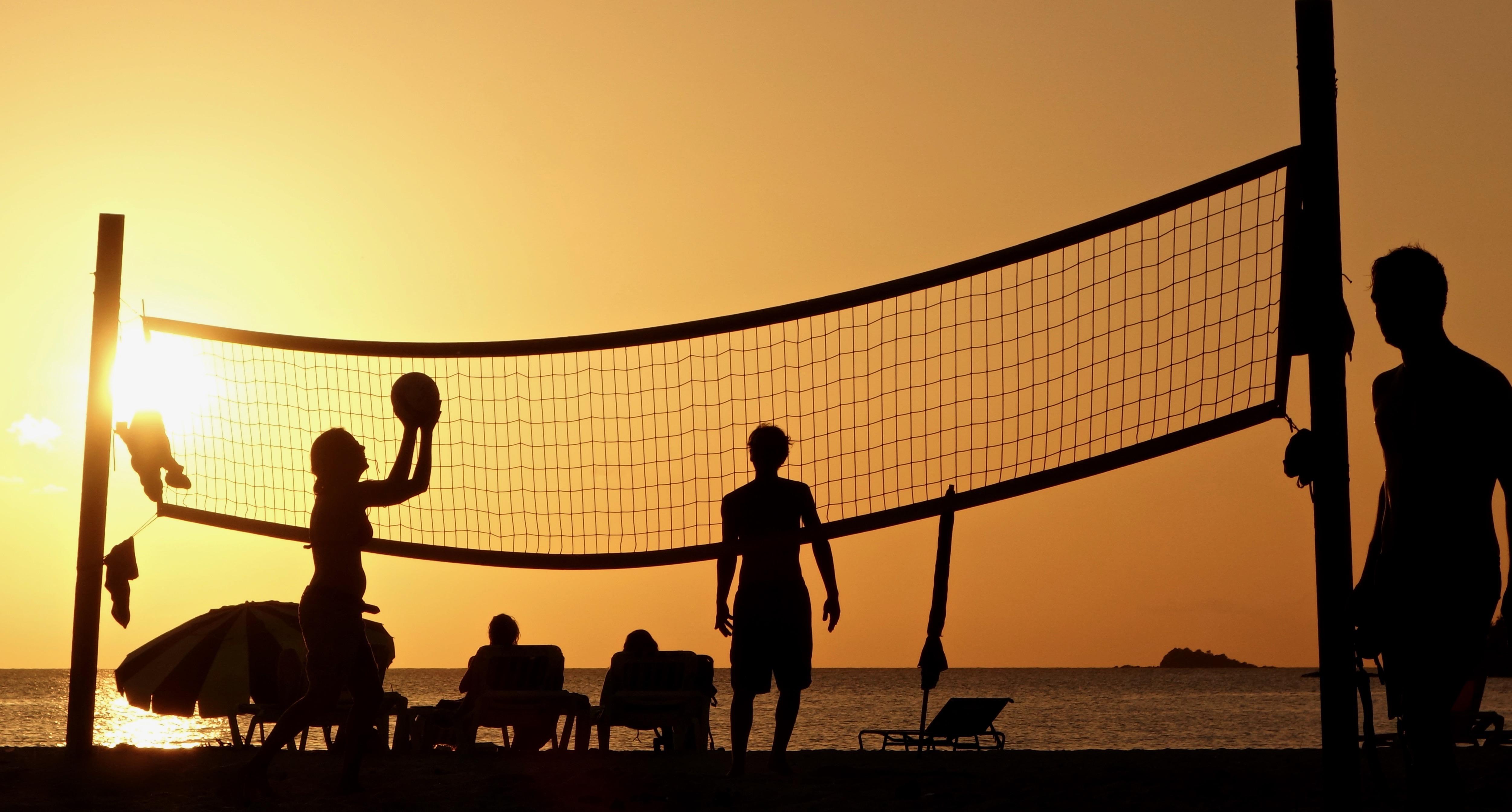 5005x2689 Silhouette Photography Of People Playing Beach Volleyball · Free