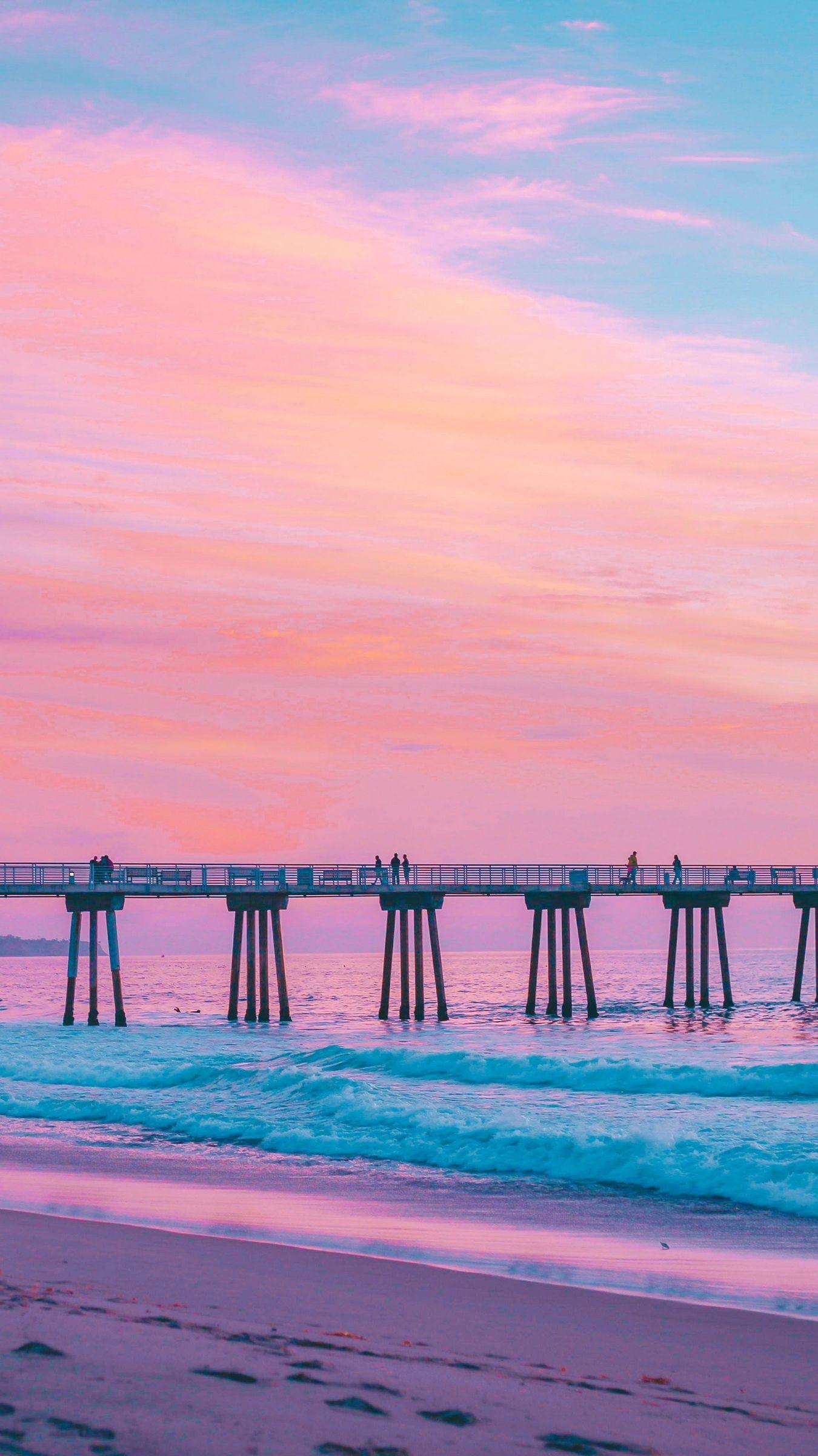 1350x2400 Download wallpaper 1350x2400 pier, sea, surf, pink, hermosa beach