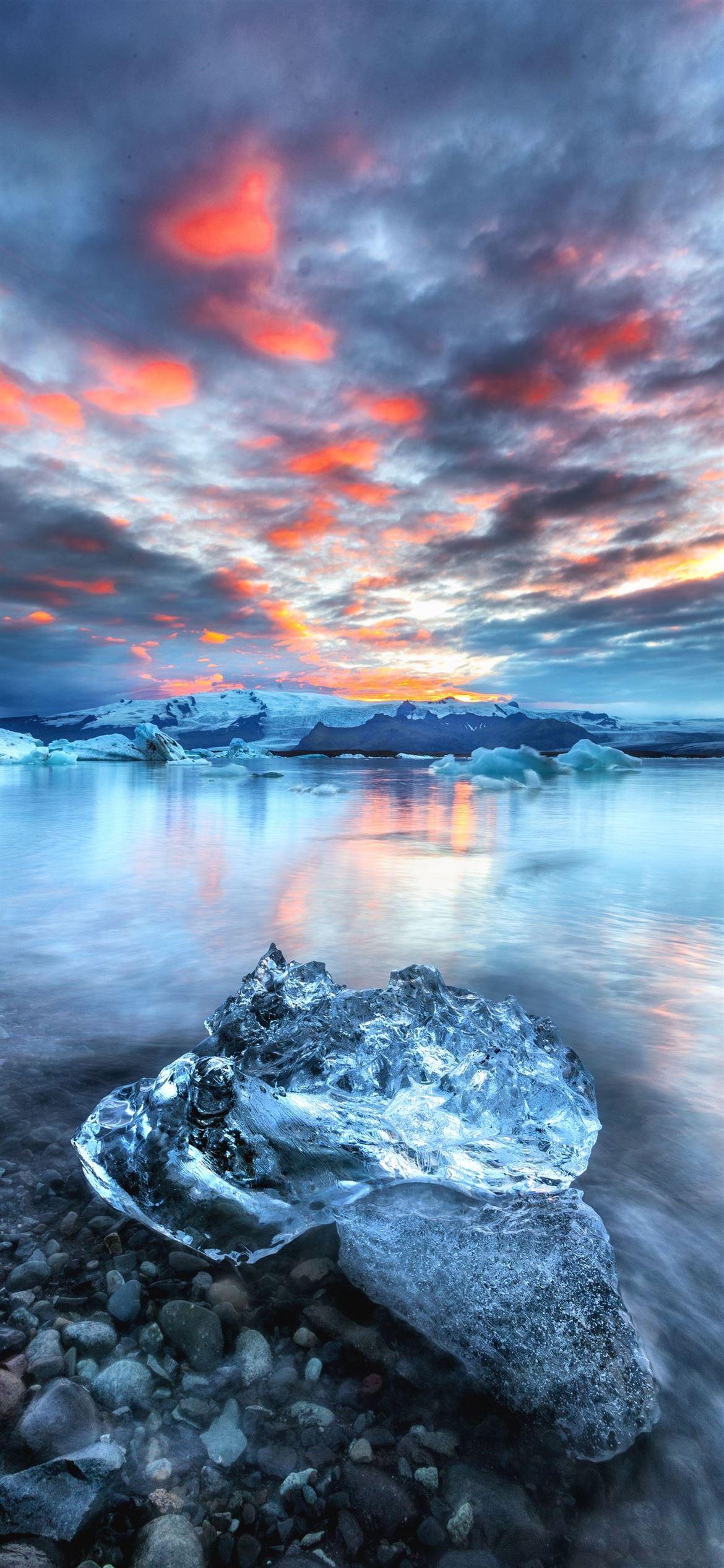 1170x2532 block of ice near water iPhone 12 Wallpaper Free Download