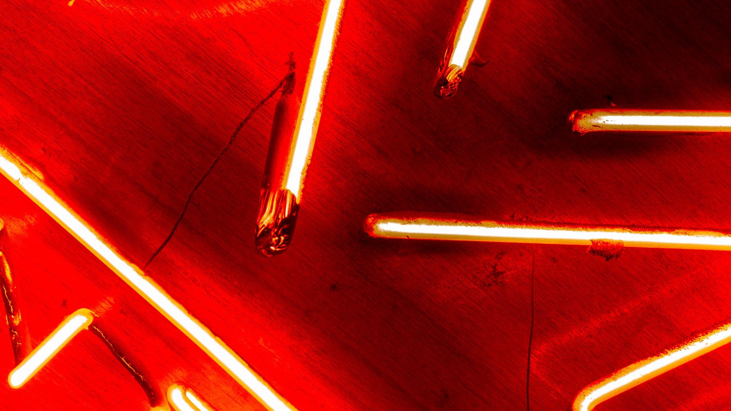 2560x1440 Download wallpaper 2560x1440 neon, lamps, red, glow, light widescreen 16:9 HD background