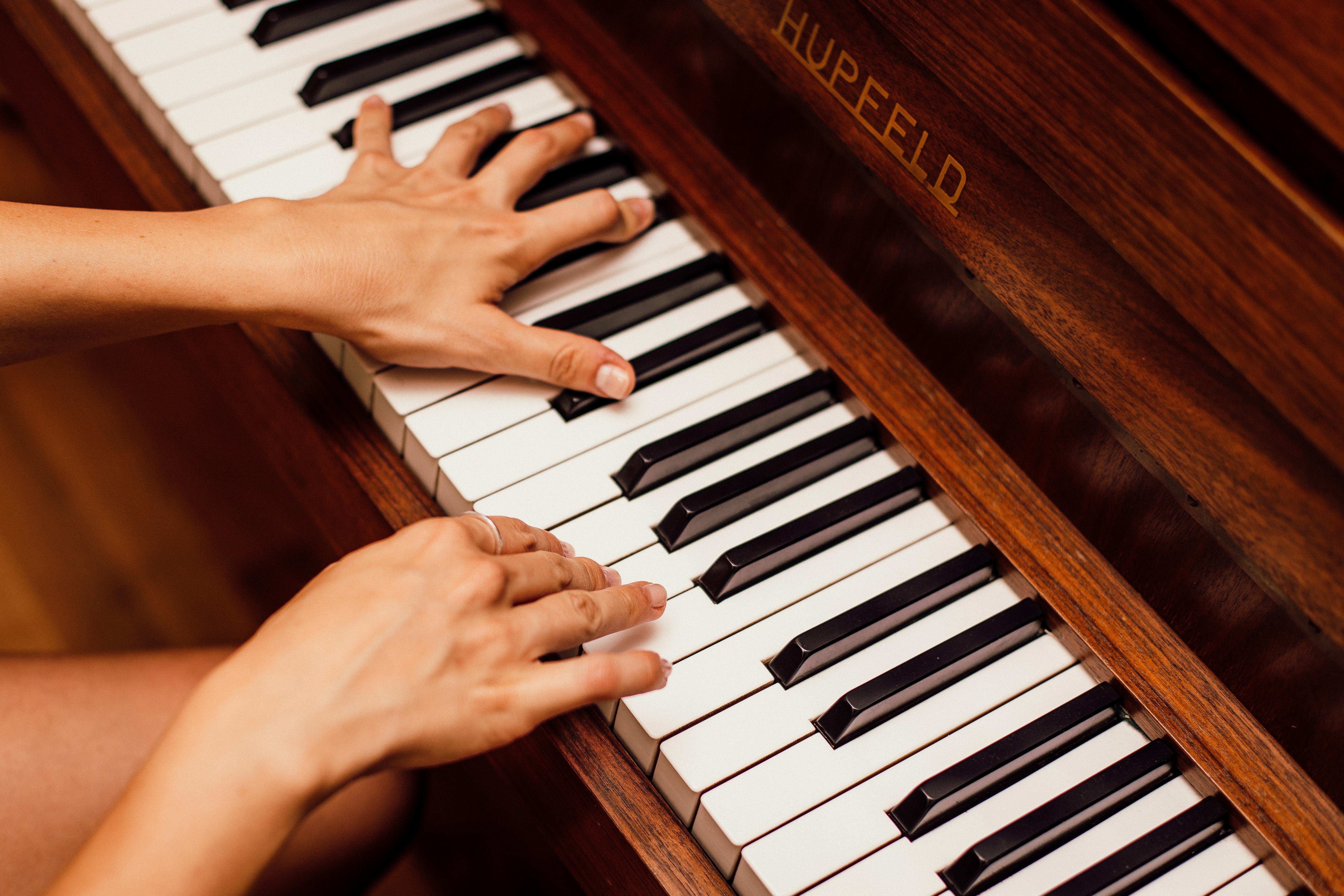 5645x3763 Close Up Photo Of Person Playing Piano · Free