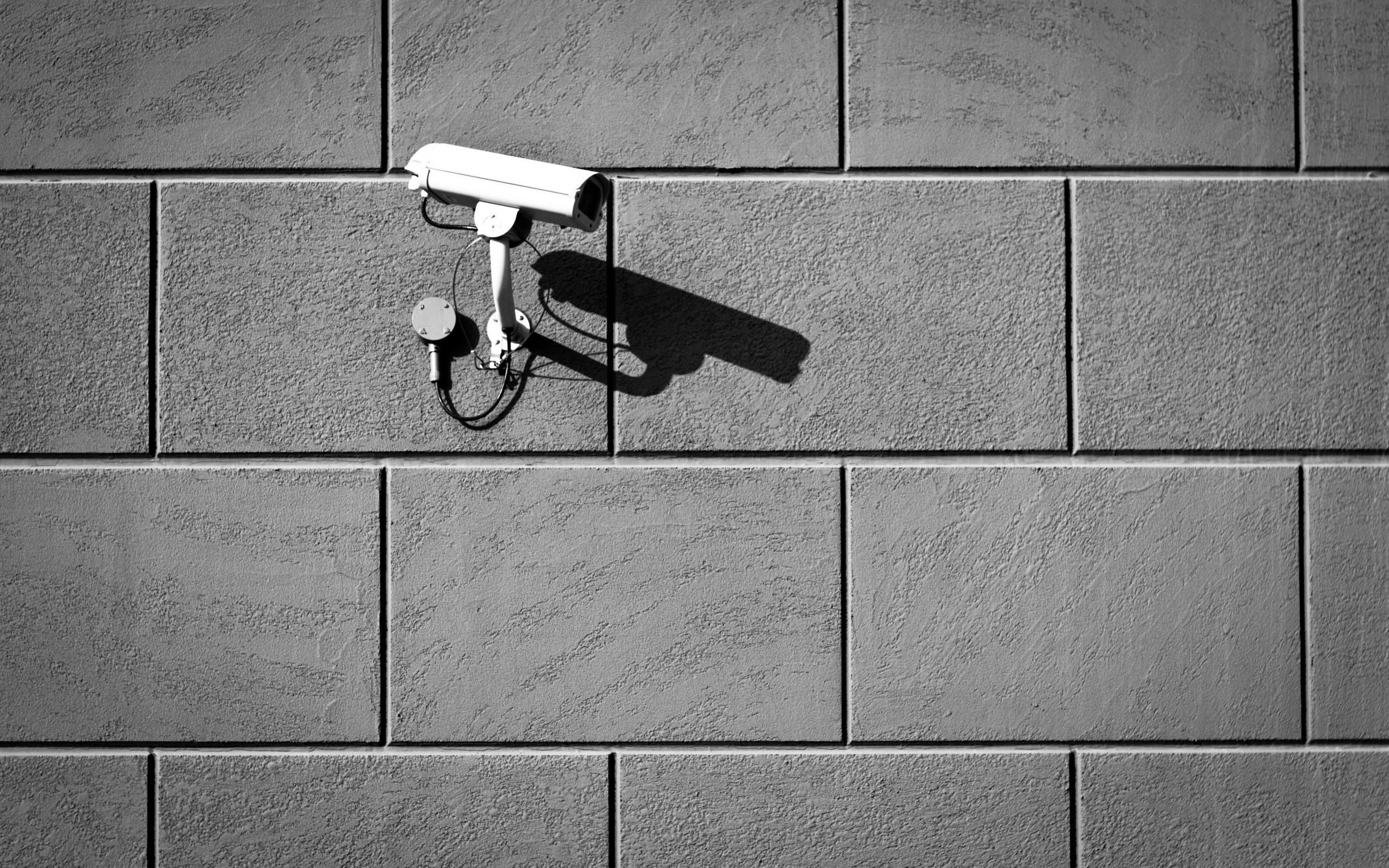 2880x1800 Camera On Wall MacBook Air Wallpaper Download