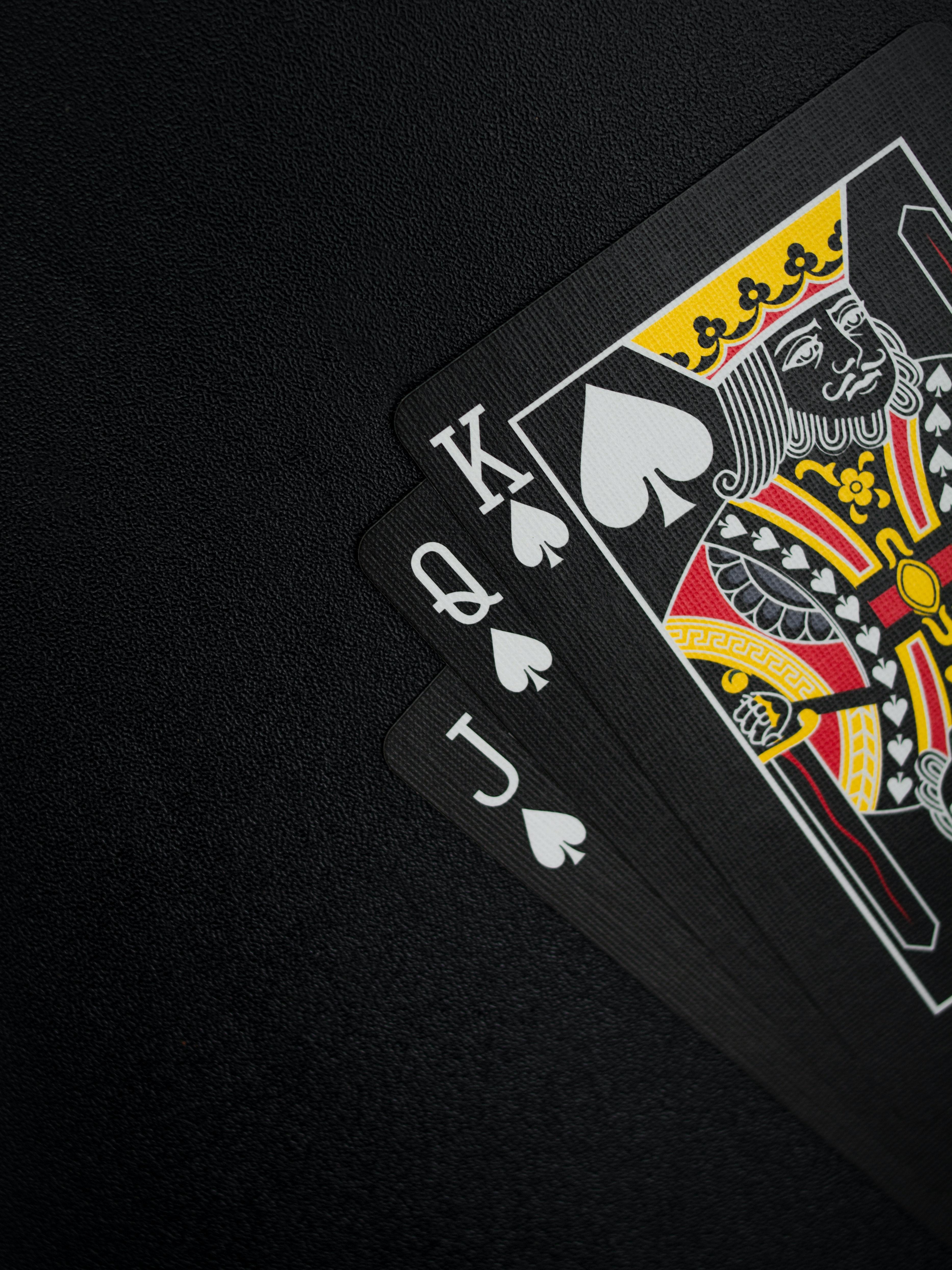 3733x4977 Black Playing Cards on Black Background · Free
