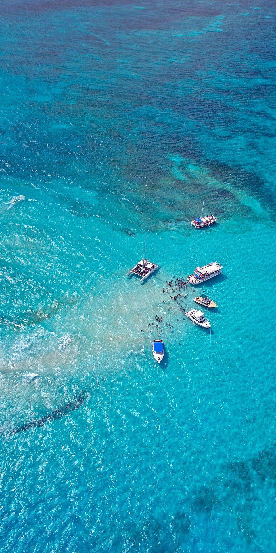 960x1920 Georgetown, Grand Cayman. Grand Cayman is where the high life meets island life. You up for it? We thought so. Grand cayman island, Bahamas travel, Grand cayman