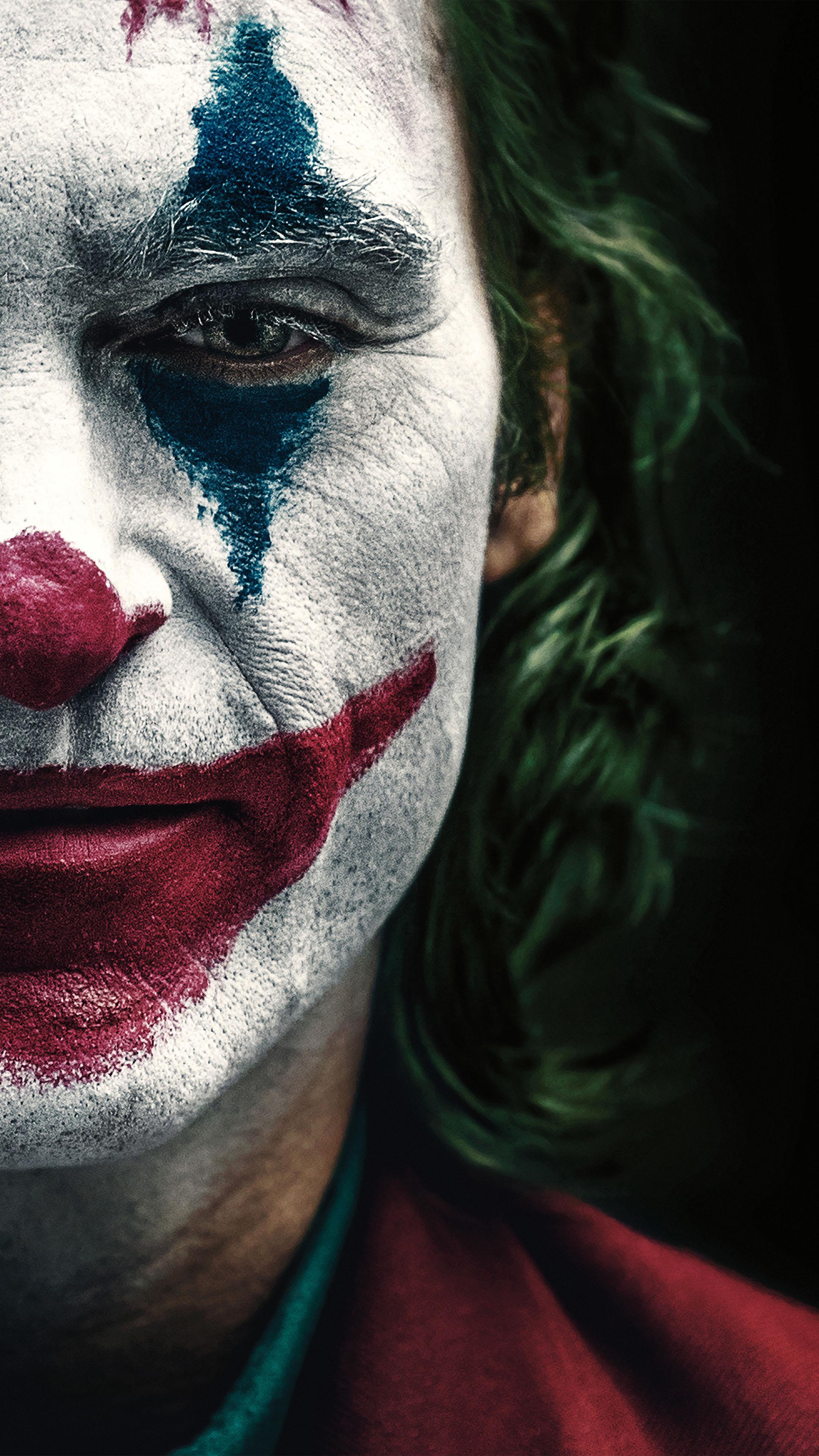 2160x3840 Joaquin Phoenix In And As Joker 2019 4K Ultra HD Mobile Wallpaper