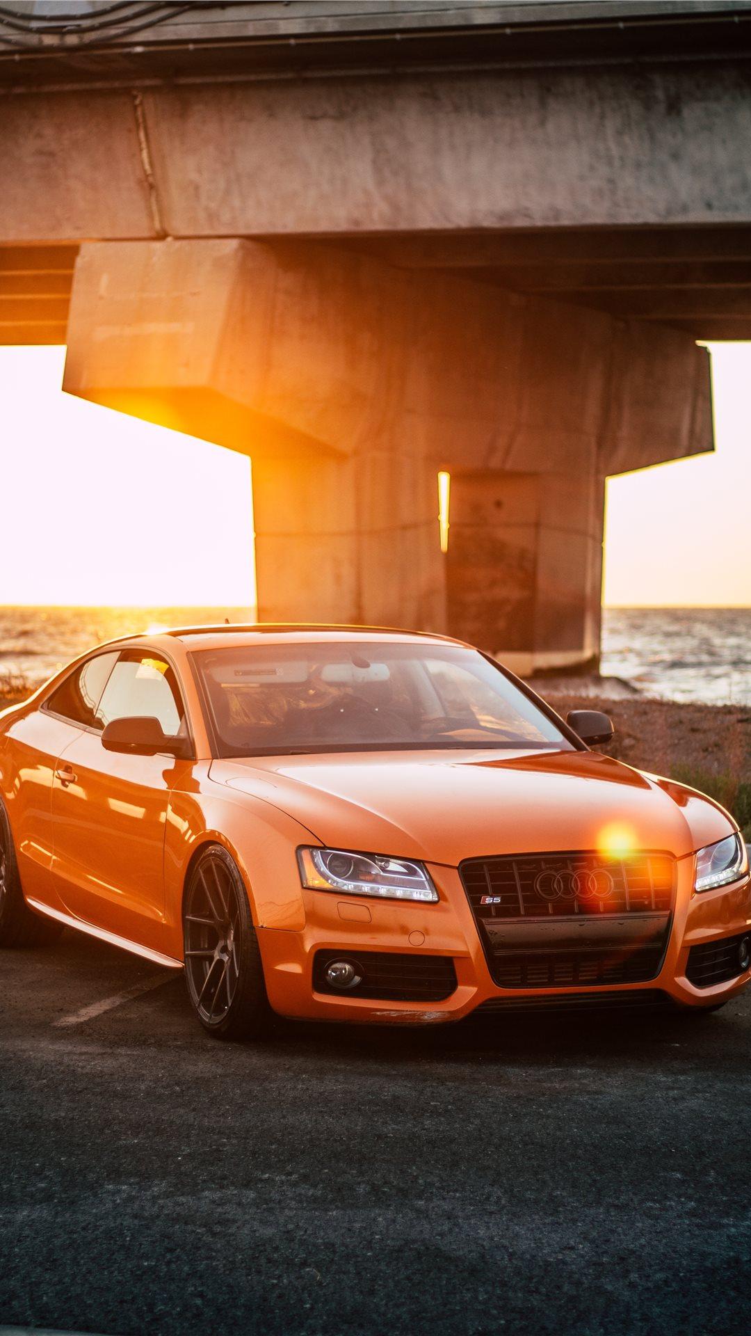 1080x1920 orange Audi coupe parked on gray concrete road iPhone 8 Wallpaper Free Download