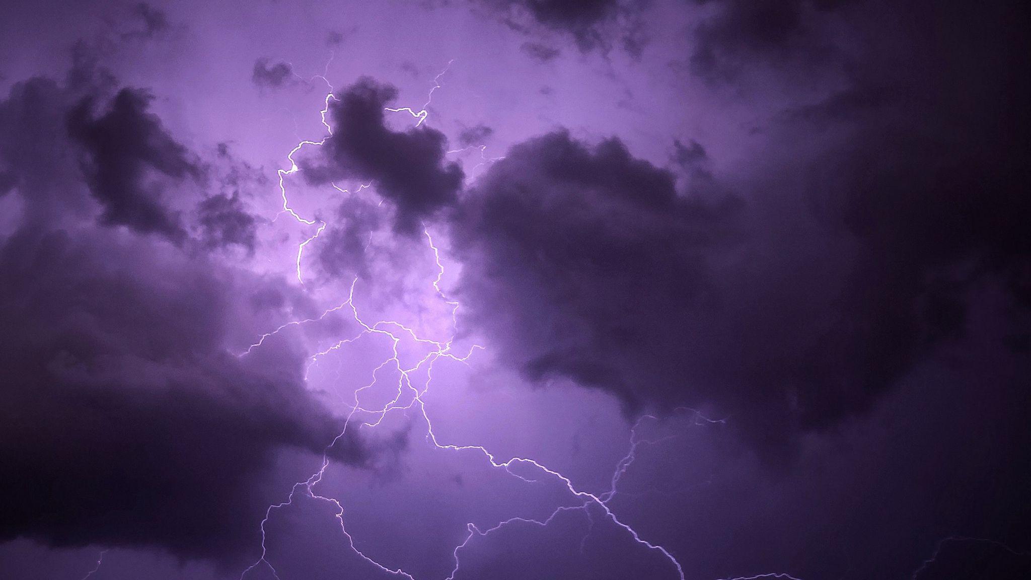 2048x1152 Download wallpaper 2048x1152 lightning, thunderstorm, clouds, purple ultrawide monitor HD background