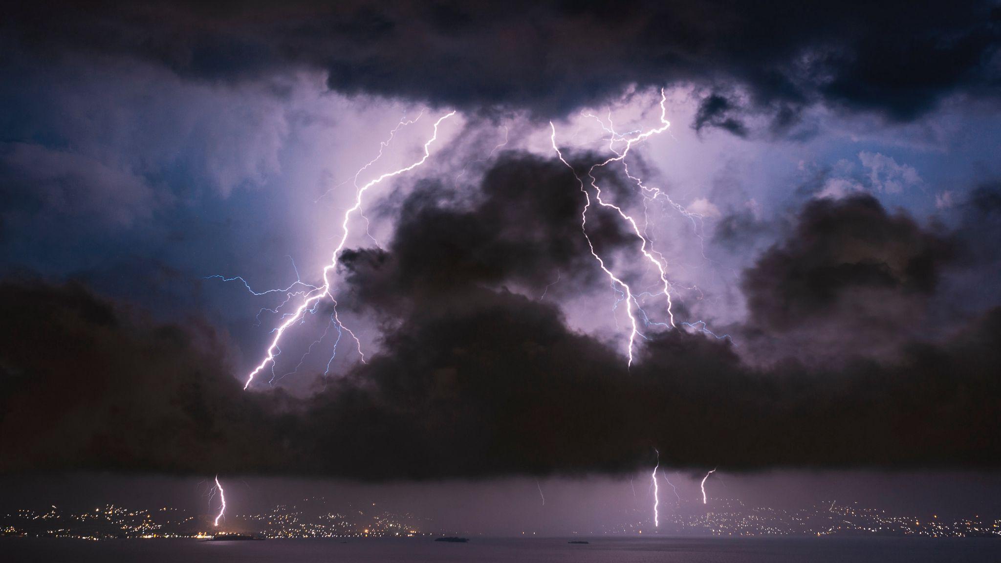 2048x1152 Download wallpaper 2048x1152 lightning, clouds, sea, night, storm ultrawide monitor HD background