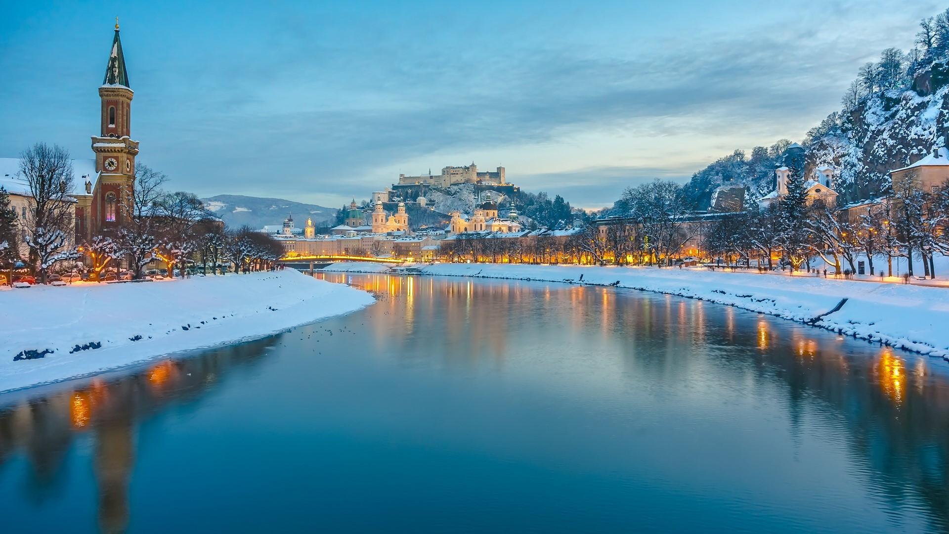 1920x1080 Historic city of Salzburg with Salzach river in winter during blue hour, Salzburger Land, Austria. Windows 10 Spotlight Image