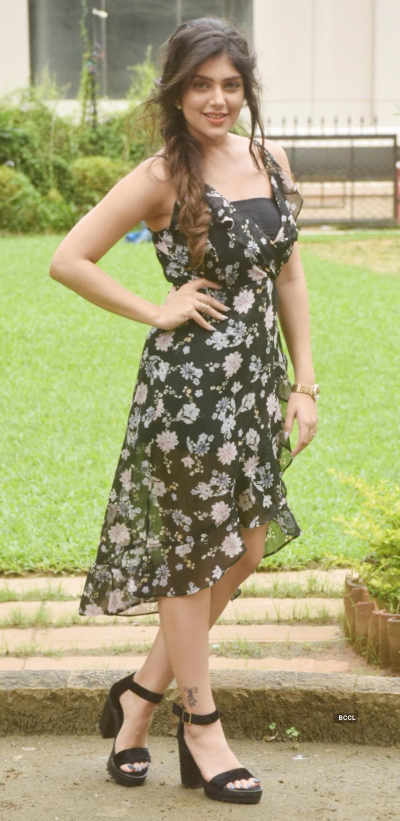 800x1641 Ishita Chauhan looks pretty in a black floral dress as she strikes a pose during the promotion of Bollywood film 'Genius' in Mumbai