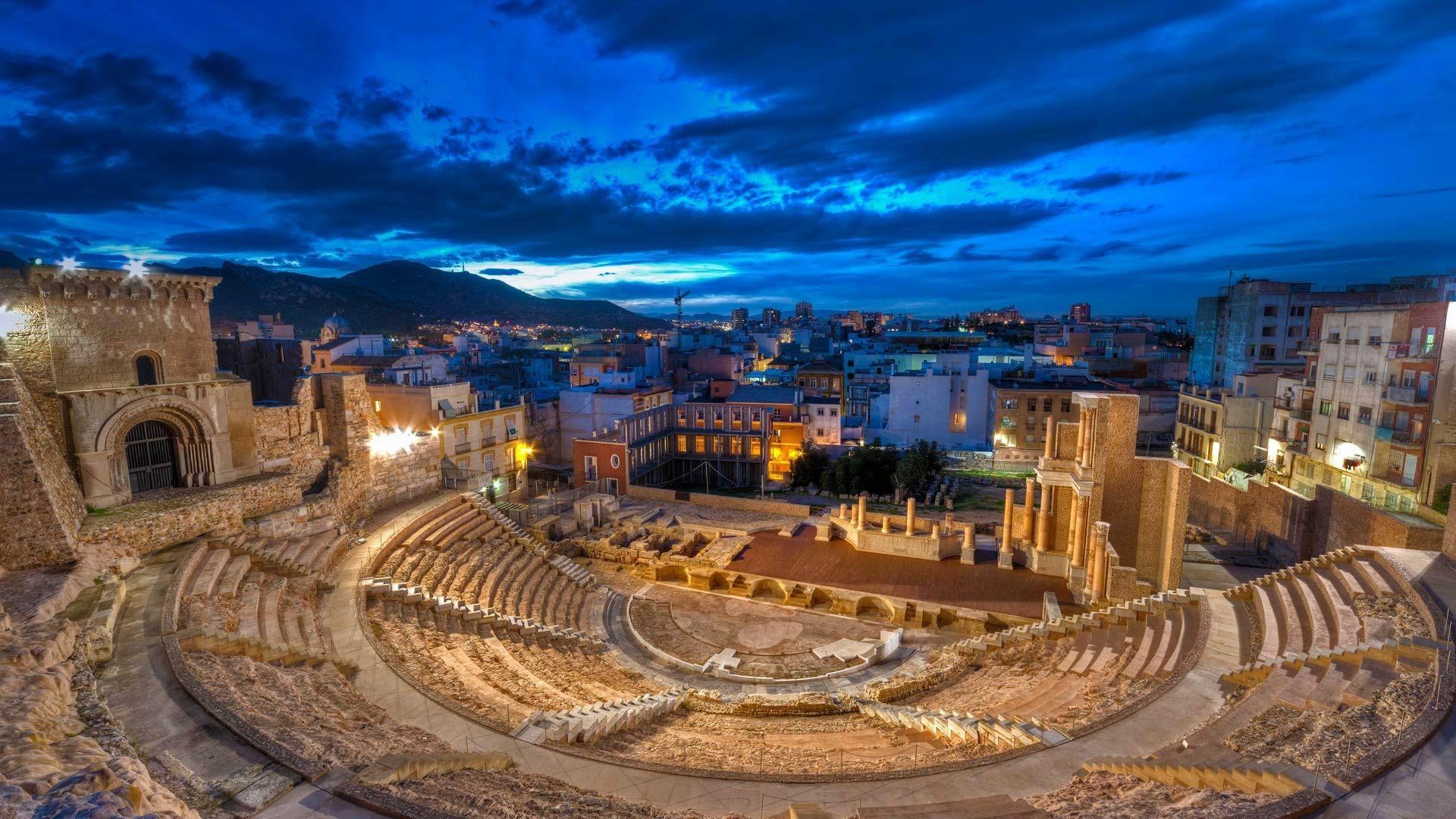 1920x1080 Wallpaper clouds, roman theater, night, lights, ruins, Cartagena