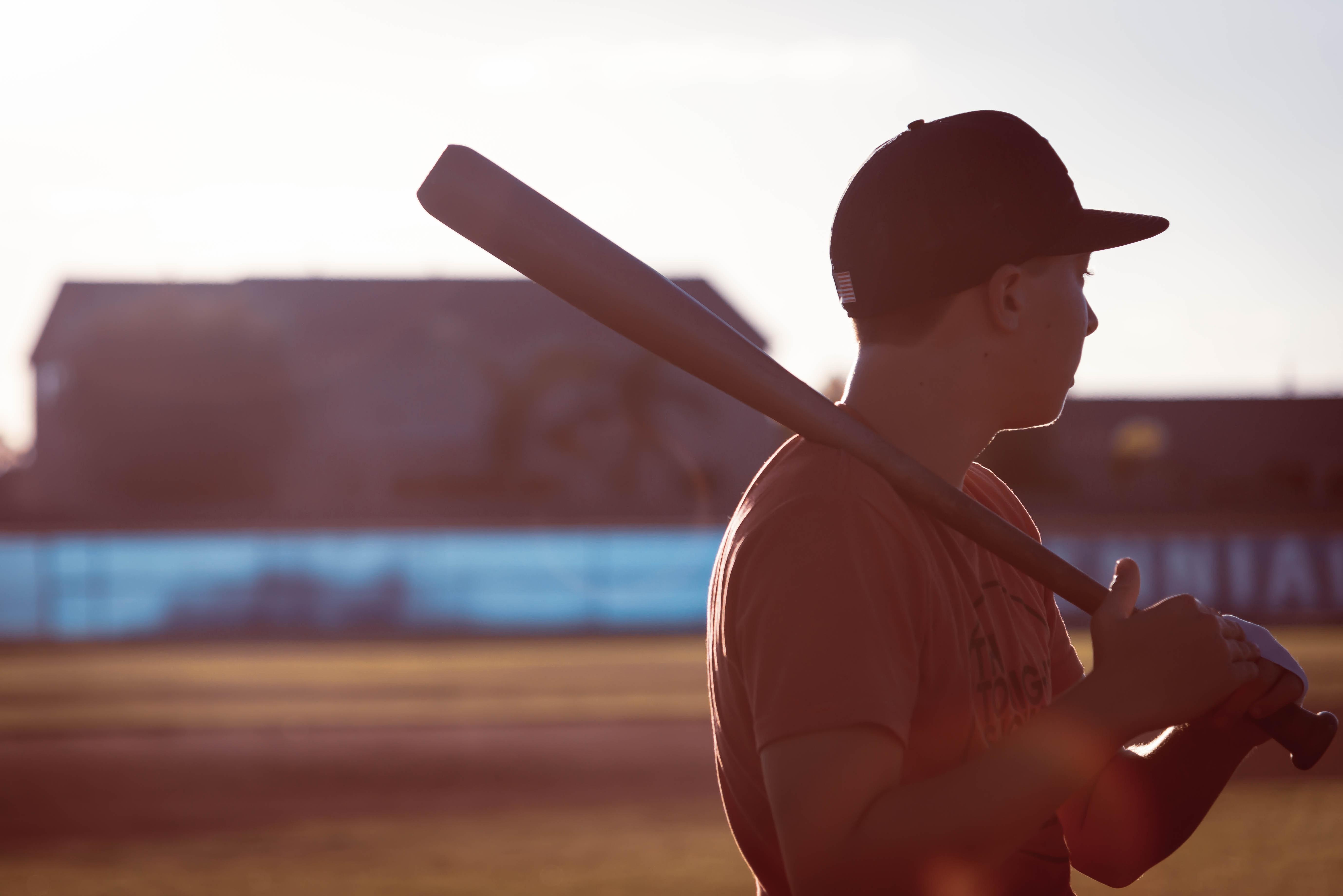 5514x3680 Man Holding Baseball Bat · Free