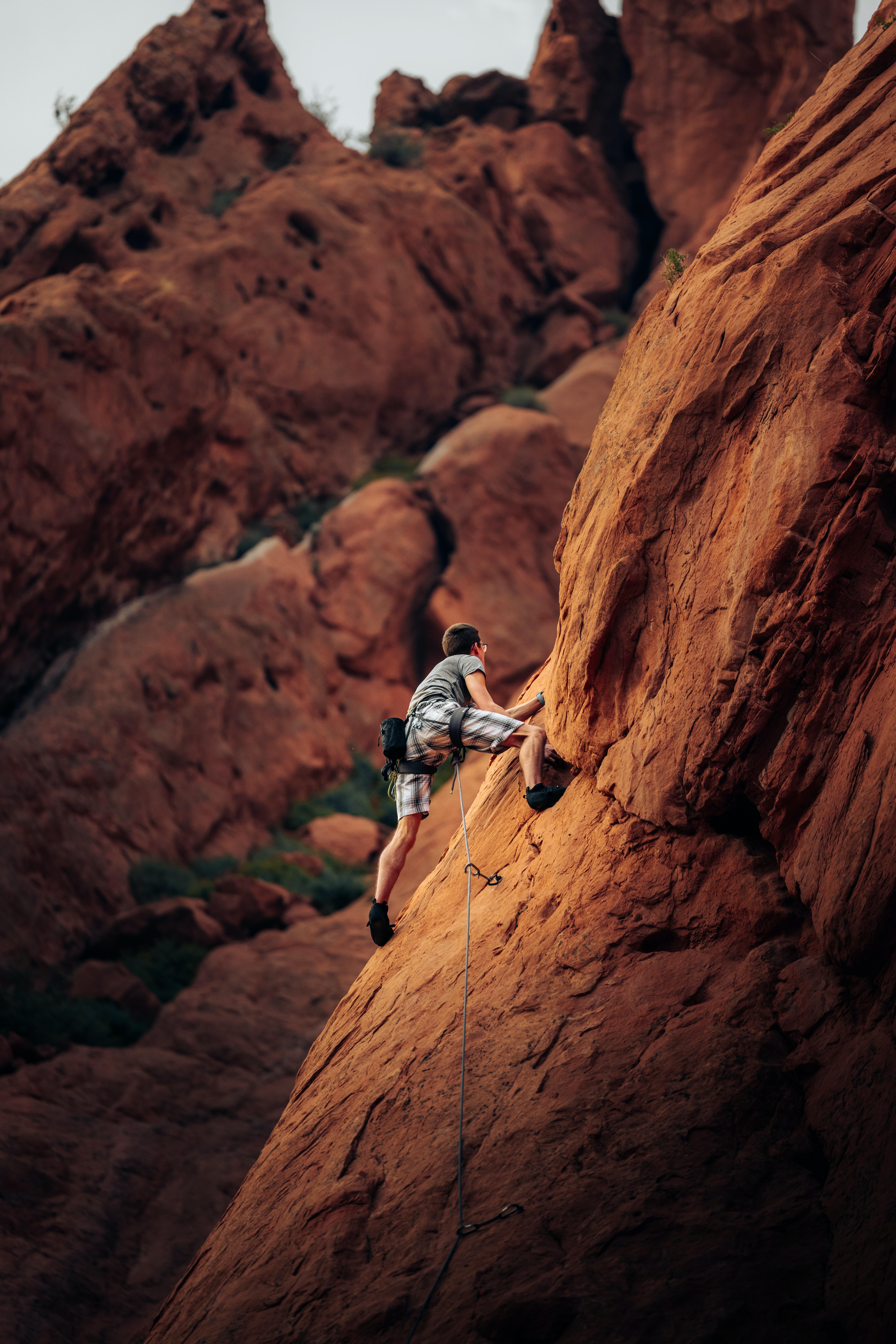 5464x8192 Man Rock Climbing on Mountain Side · Free