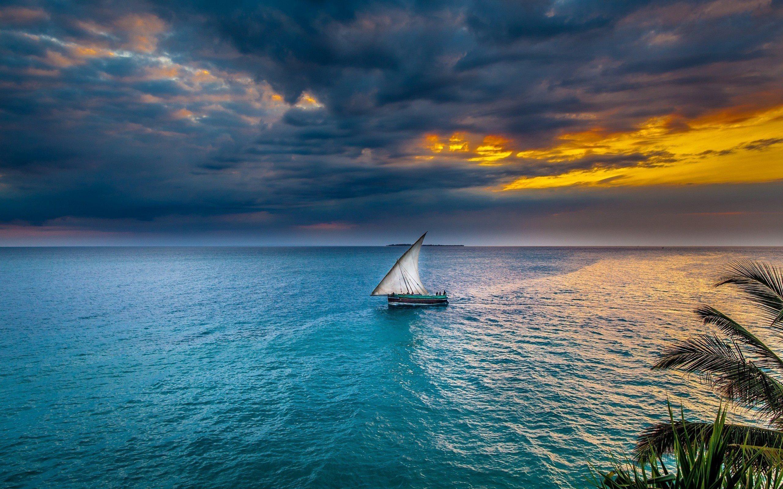 2560x1600 Download wallpaper sailboat, storm at sea, evening, sunset, tropical islands, ocean for desktop with resolution 2560x1600. High Quality HD picture wallpaper